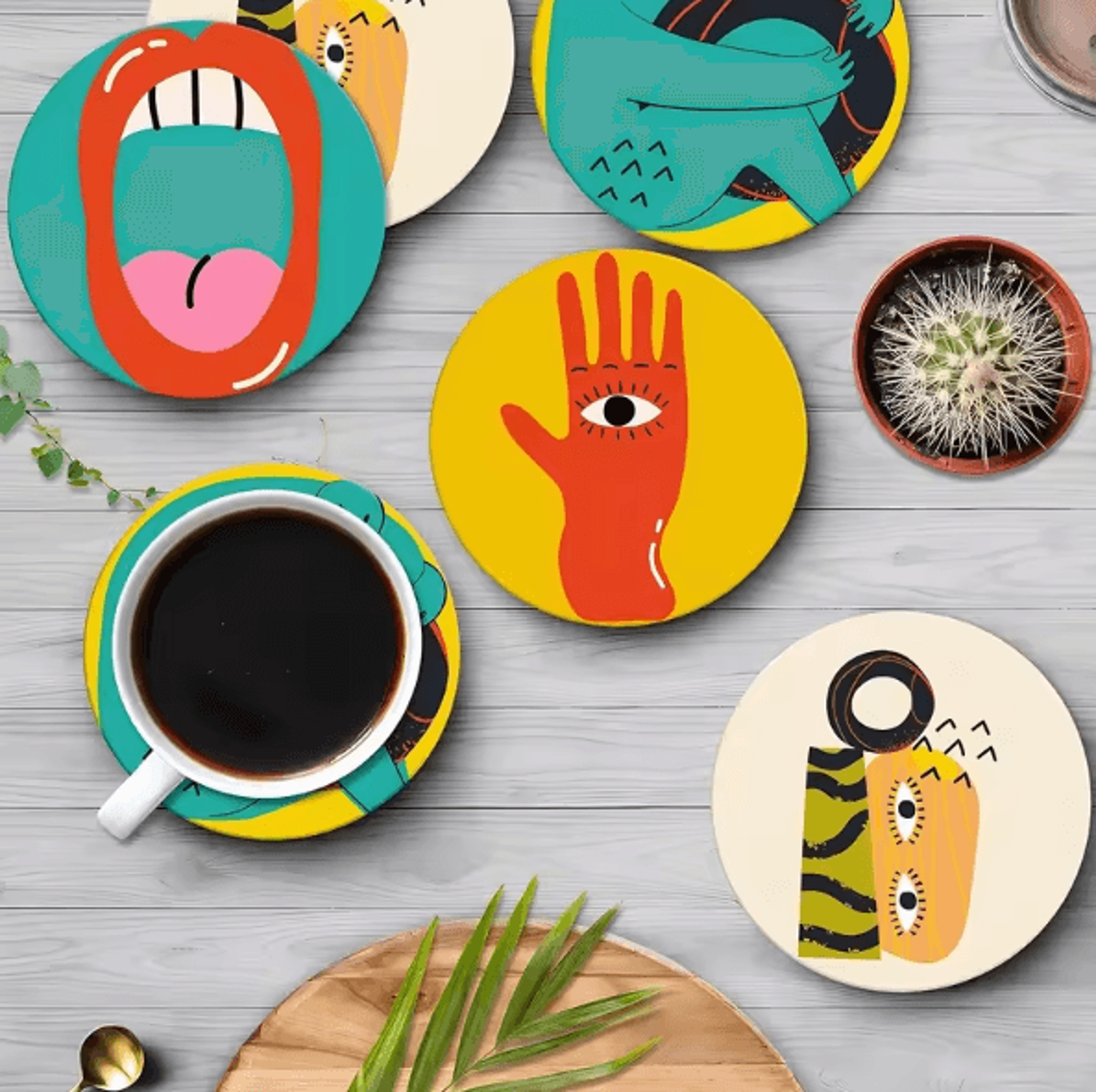 picasso style wooden coaster set for coffee cups and artistic table decor