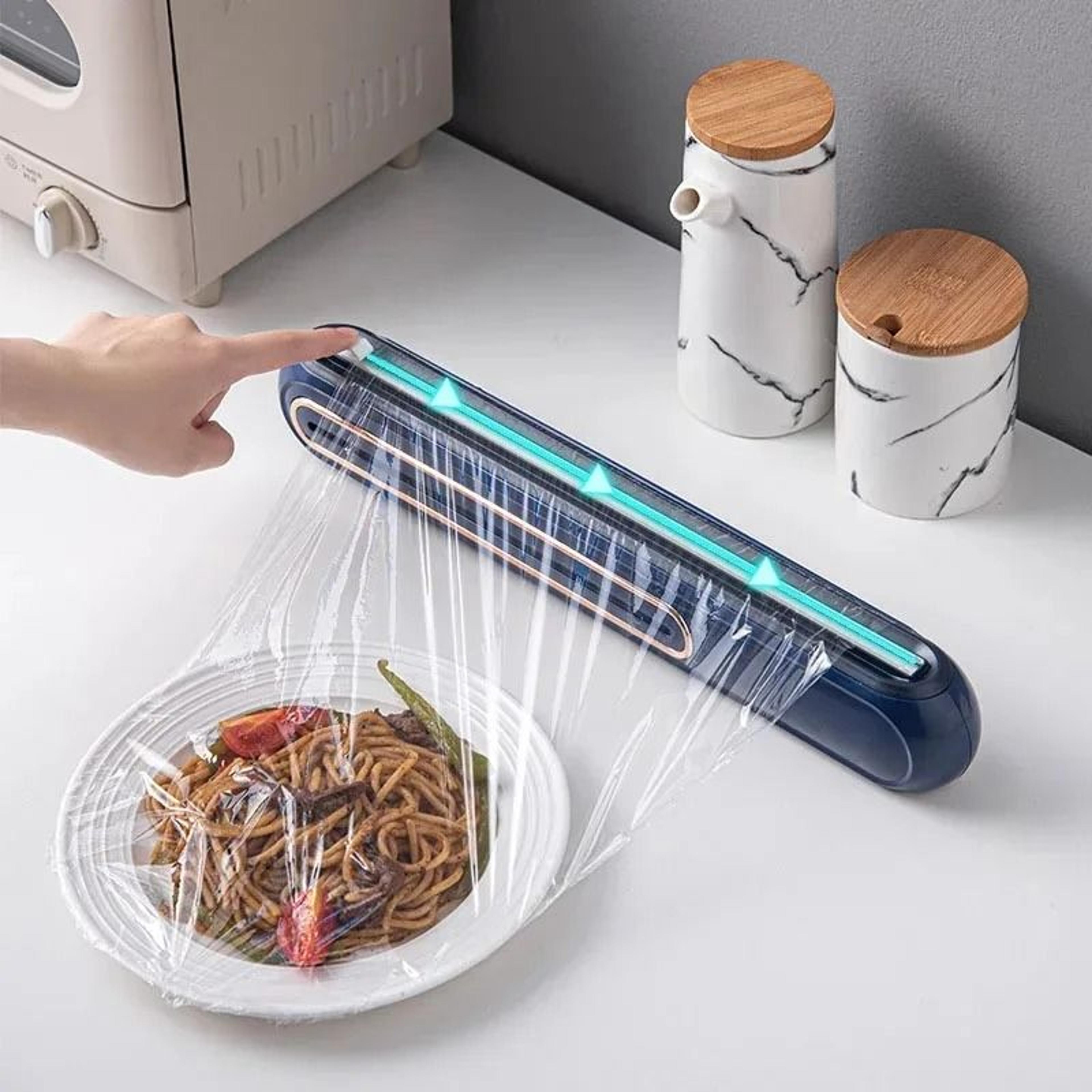 food wrap dispenser with sliding cutter for plastic wrap, foil & fresh keeping film