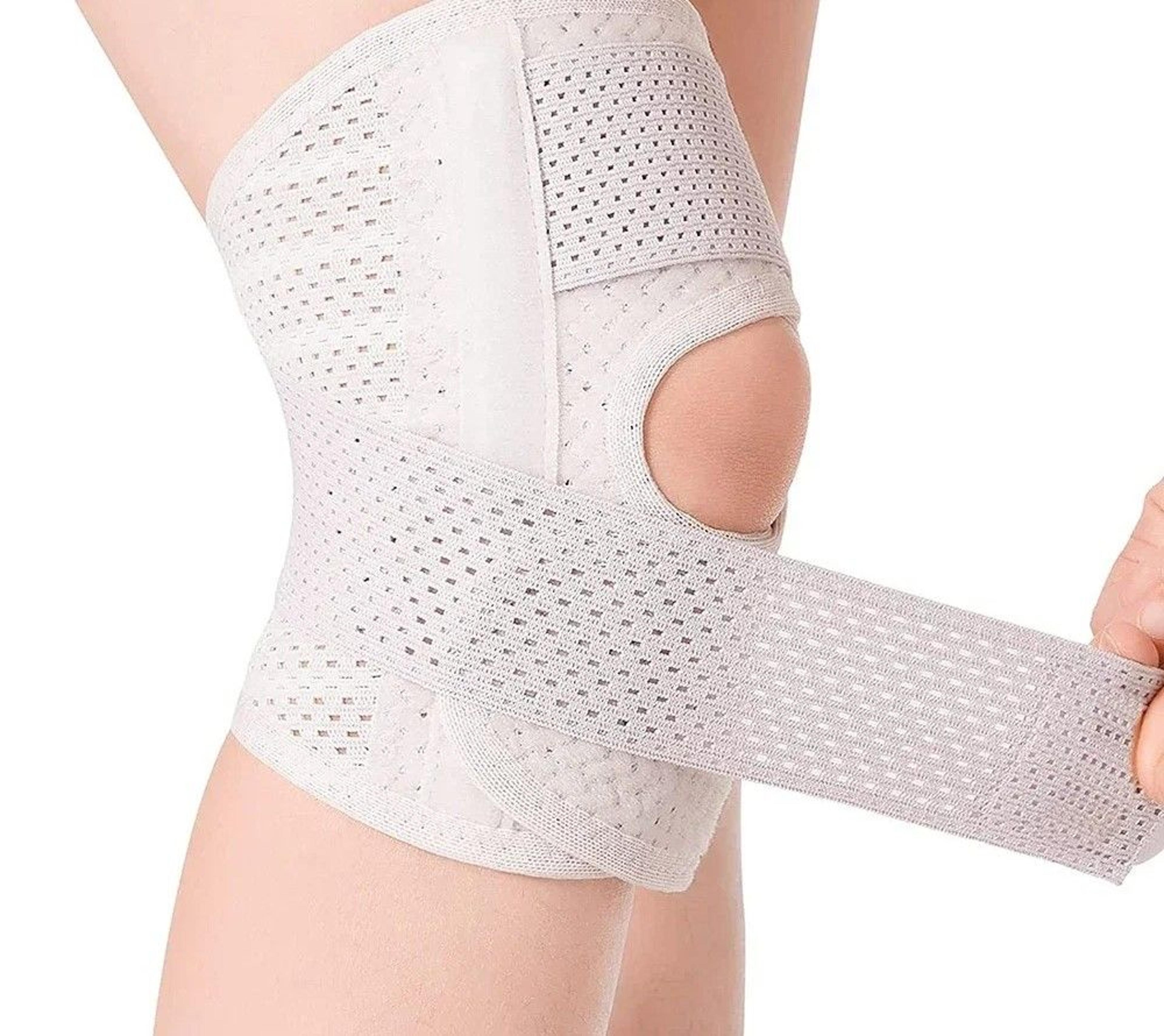 knee brace with dual side stabilizers and patella gel pad