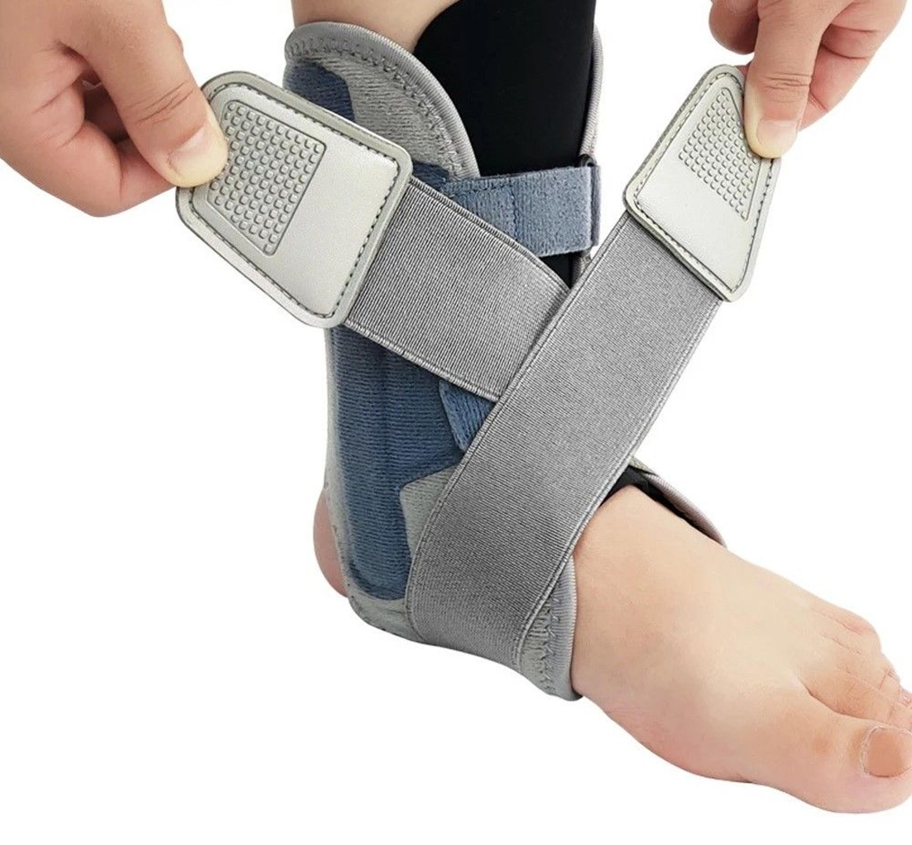 adjustable compression ankle support brace with stabilizing straps