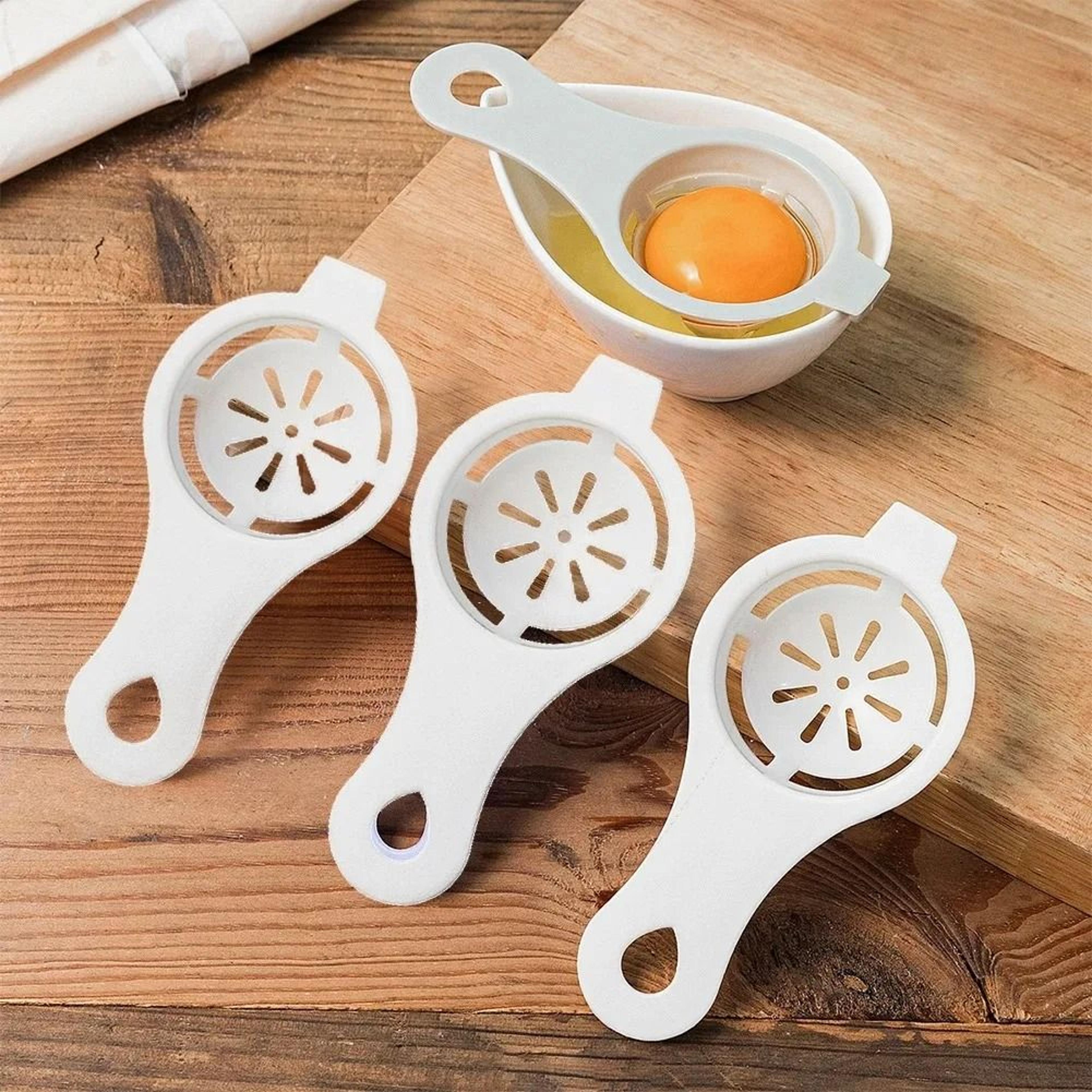 white plastic egg yolk separator and egg white filter tool for kitchen baking