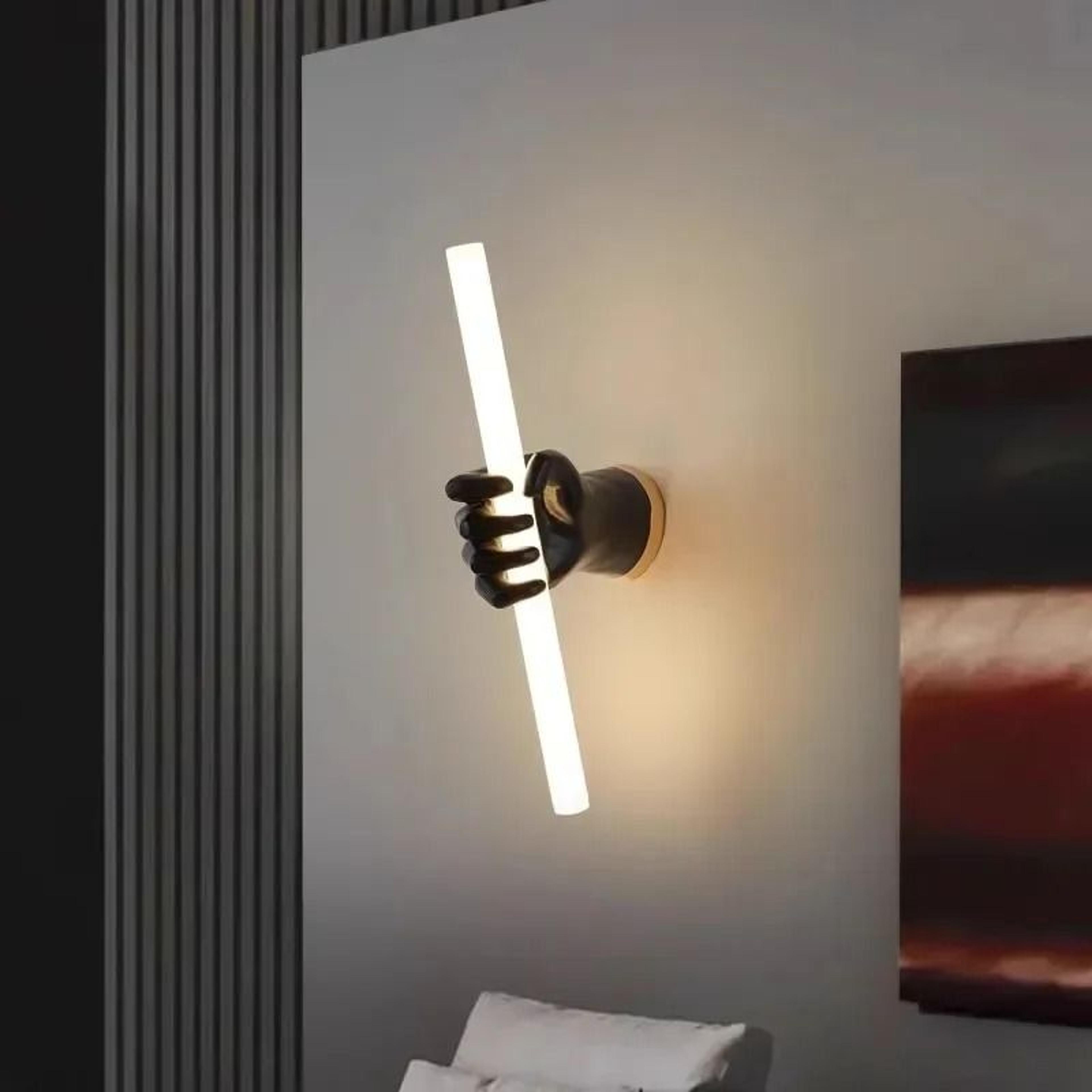 minimalist black resin fist led light wall sconce and art sculpture lamp for tv background, living room, and bedside