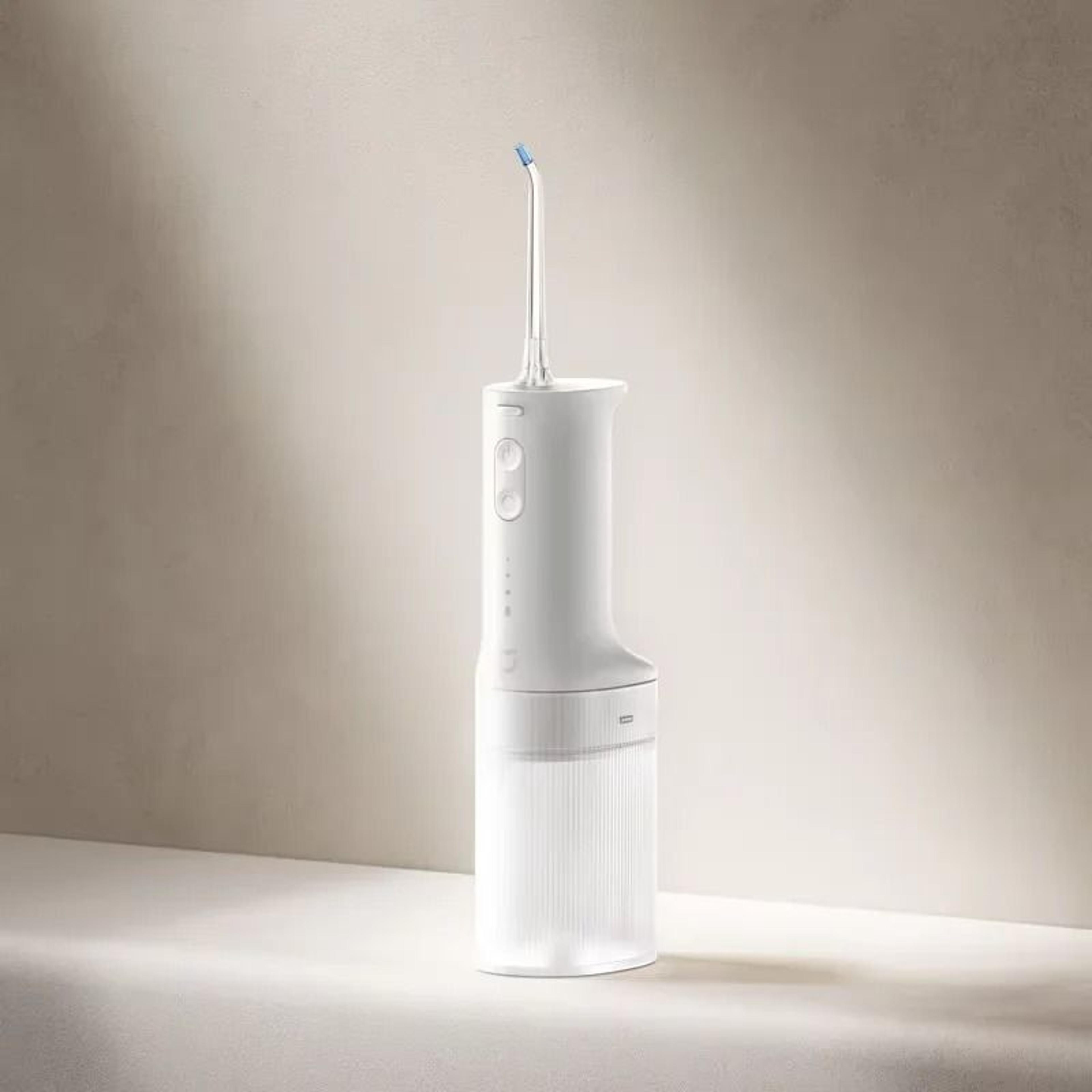 portable high frequency water flosser and dental oral irrigator with pulse technology