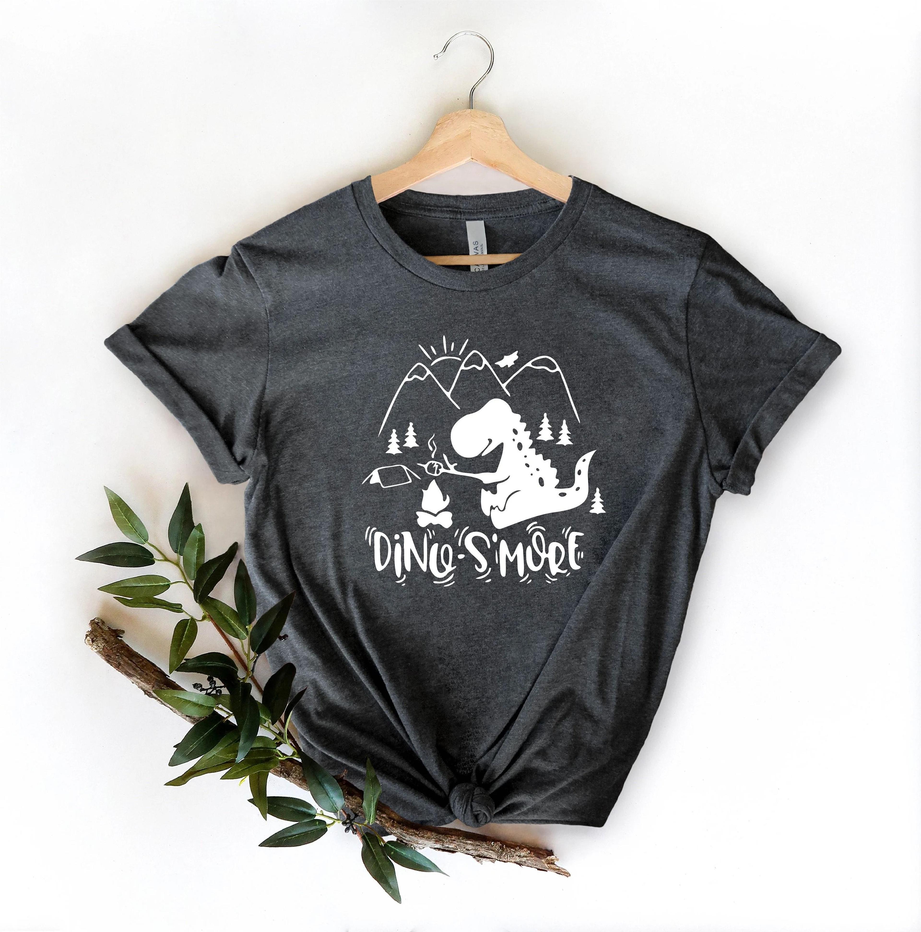 dinosaur s'more camping shirt, funny dino adventure tee, campfire graphic t-shirt