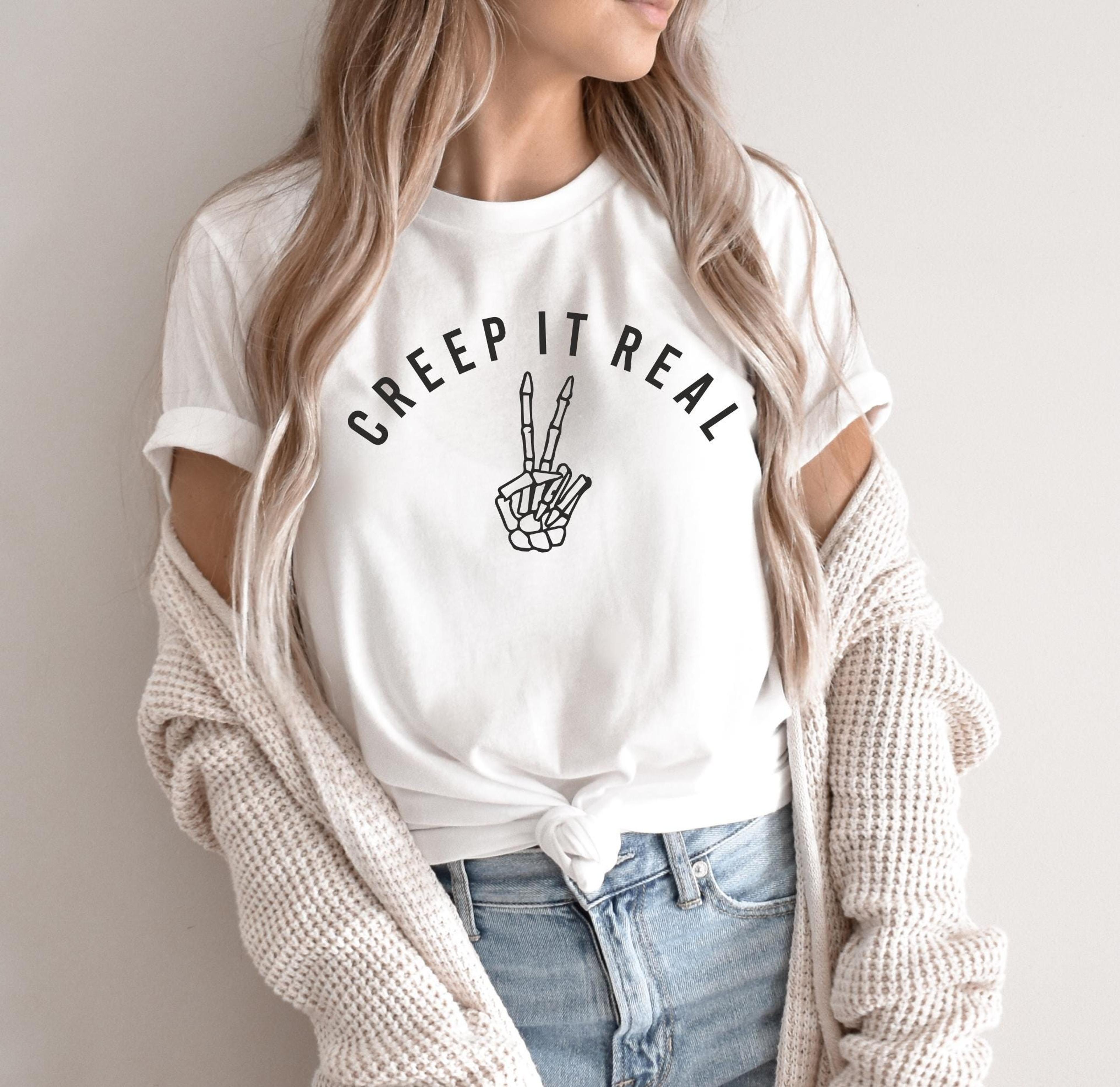 creep it real skeleton hand halloween graphic tee