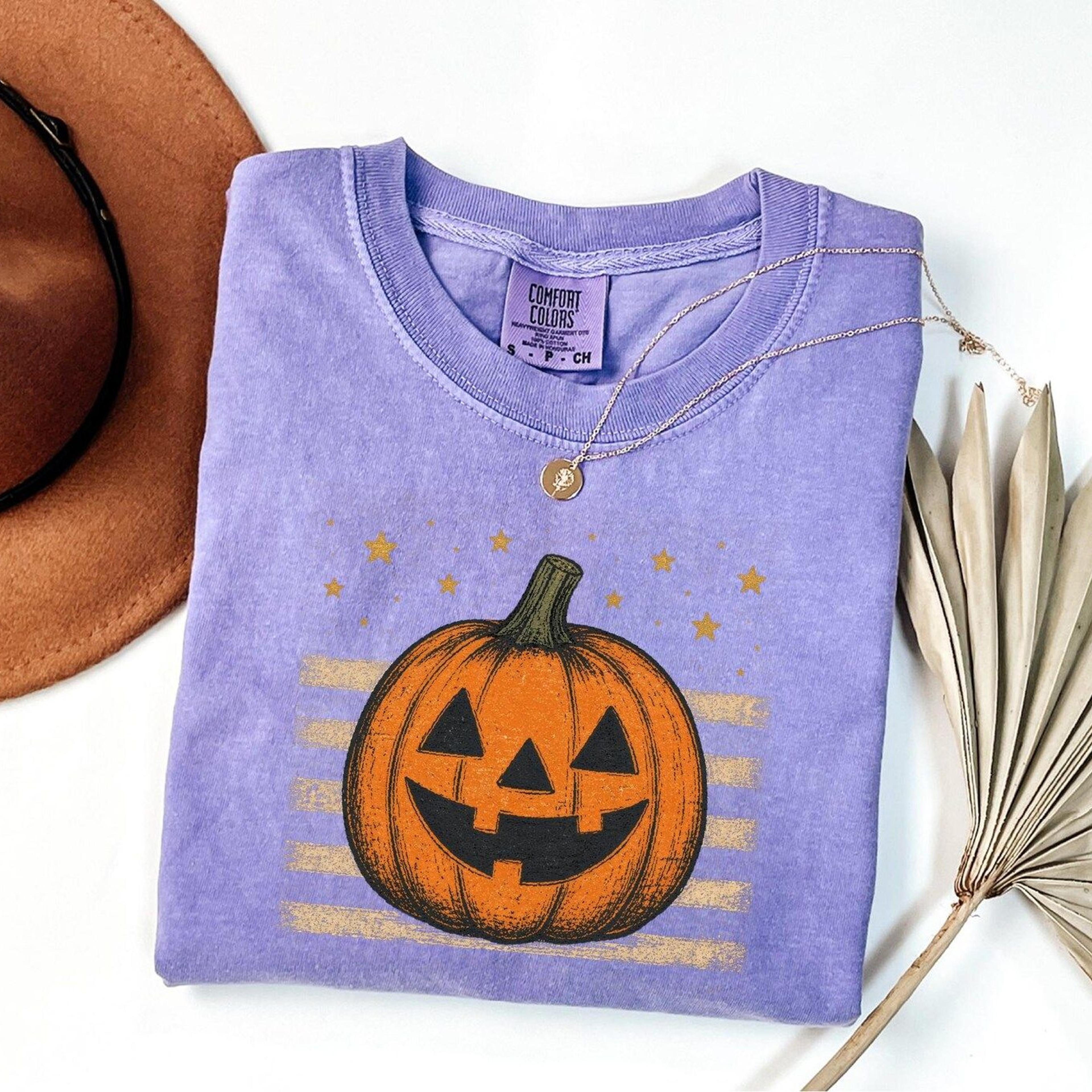 cozy autumn pumpkin shirt spooky vibes graphic tee for fall