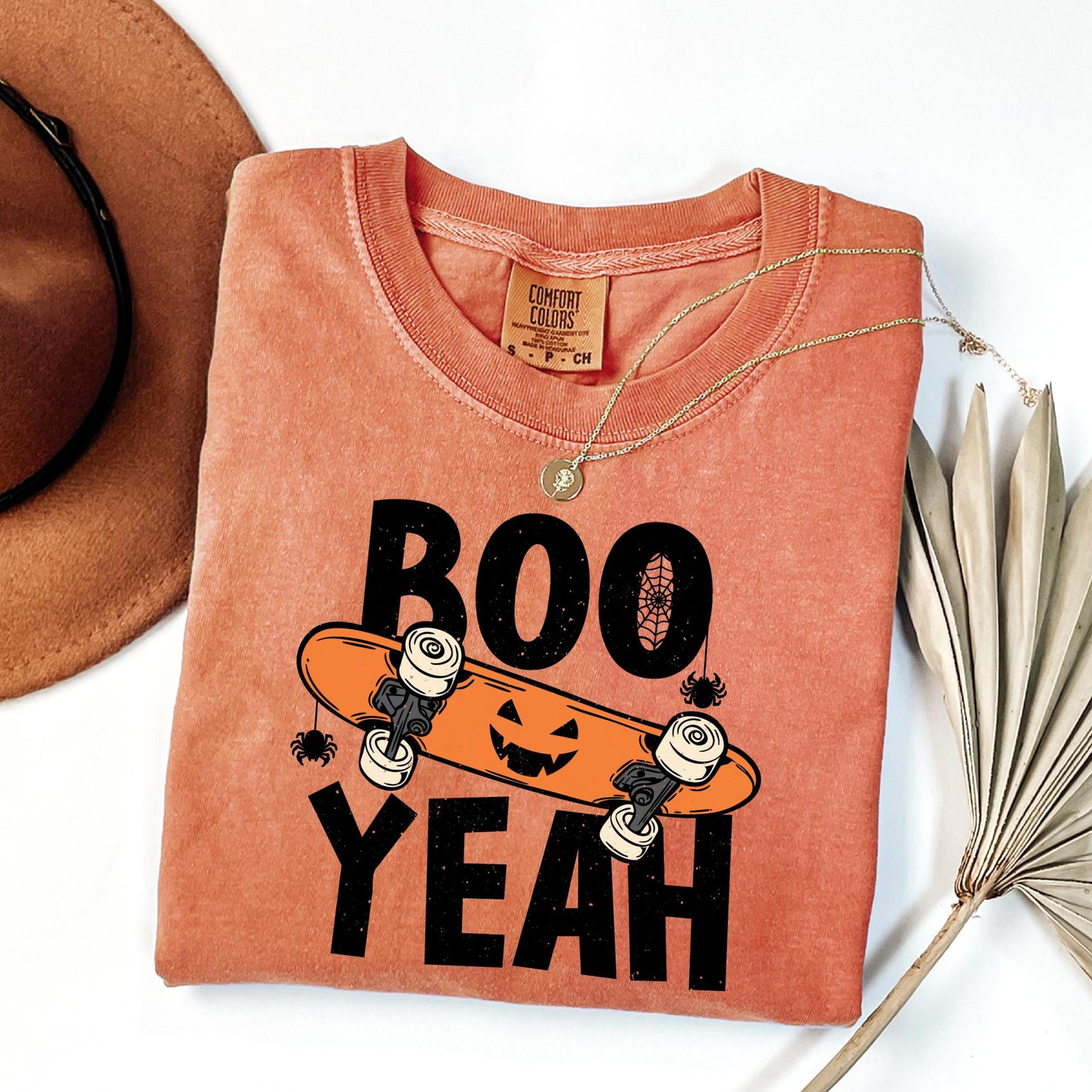 ghost on swing shirt spooky pumpkin halloween graphic tee for fall