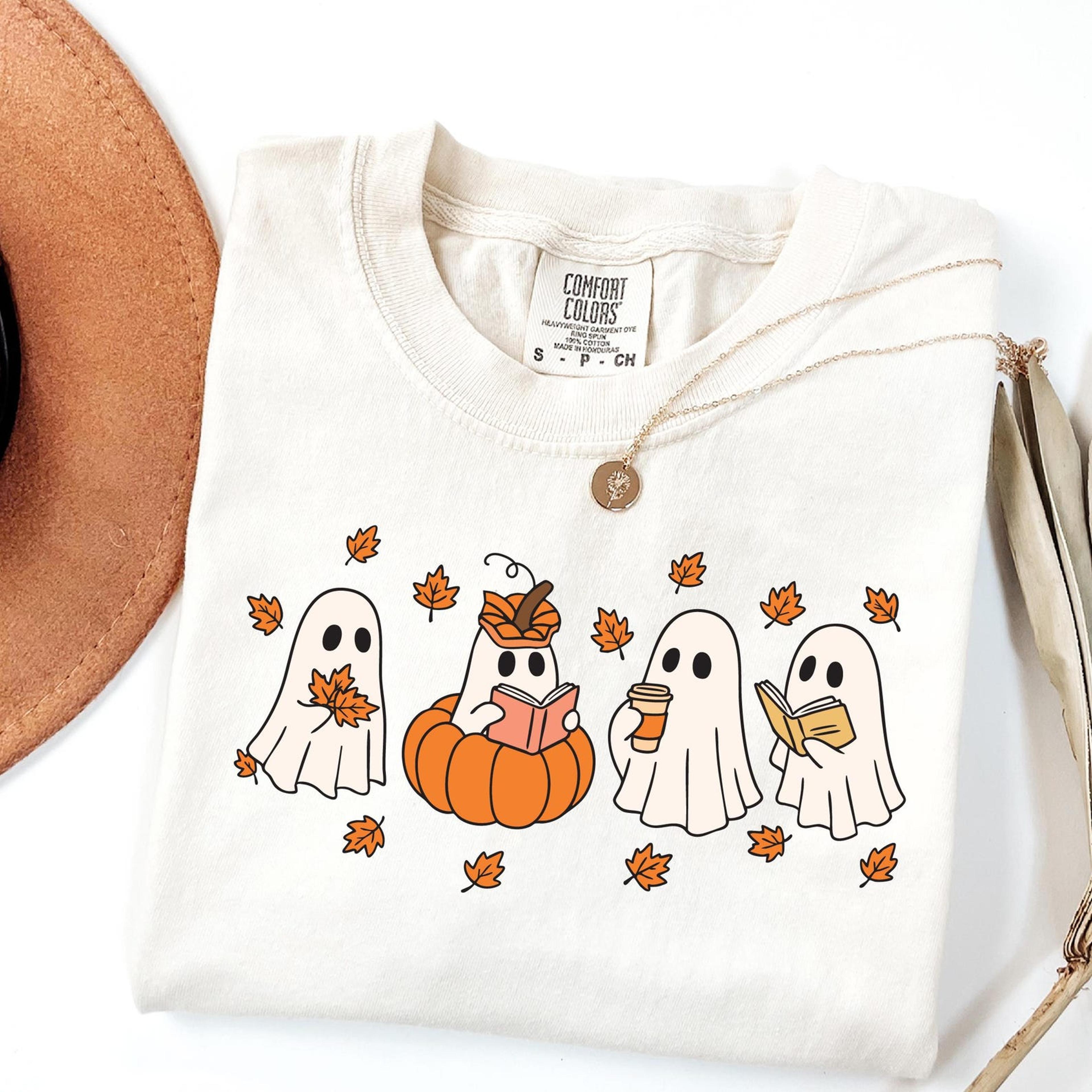 cute ghosts reading shirt ghost pumpkin bookworm halloween graphic tee