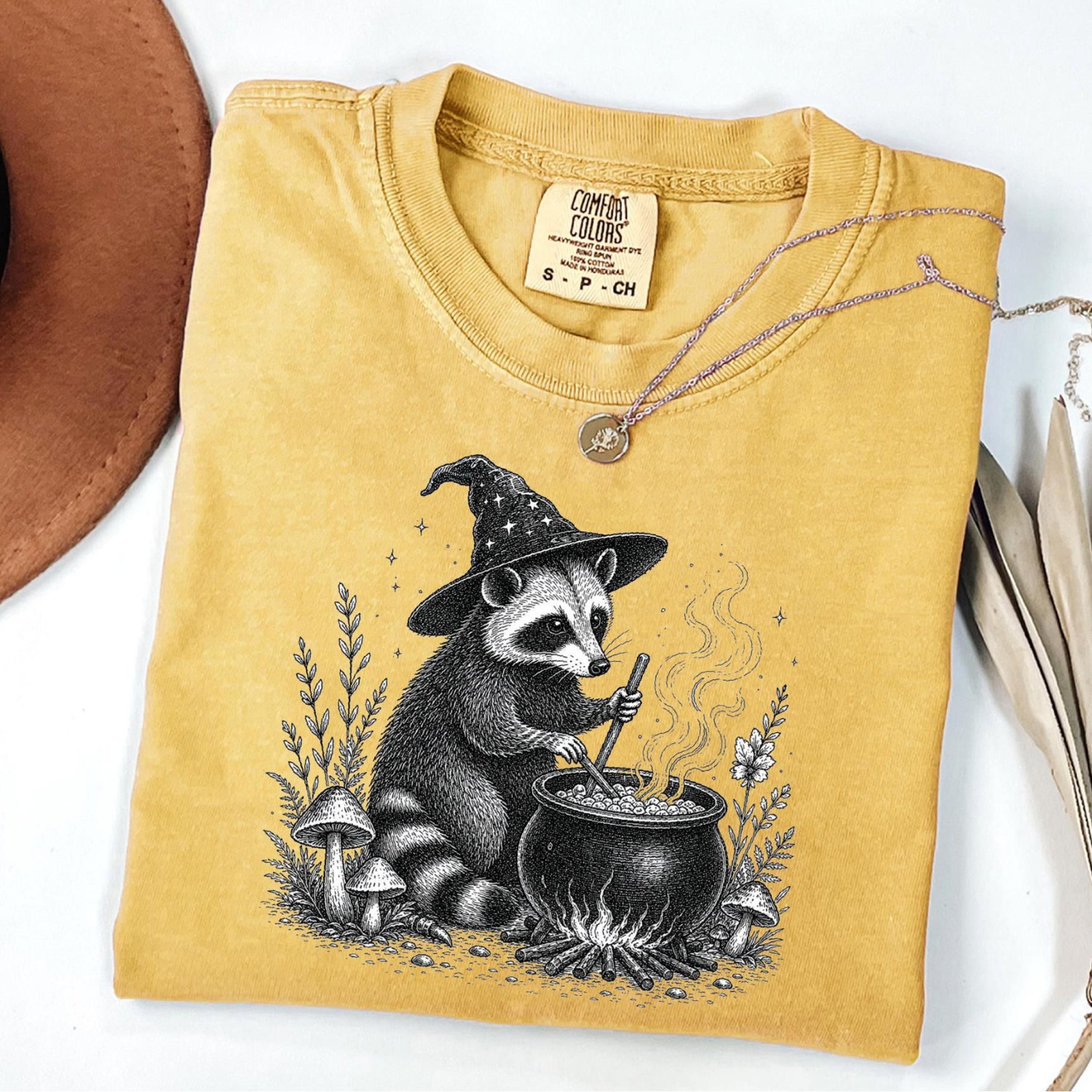 witchy raccoon shirt spooky trash panda halloween graphic tee