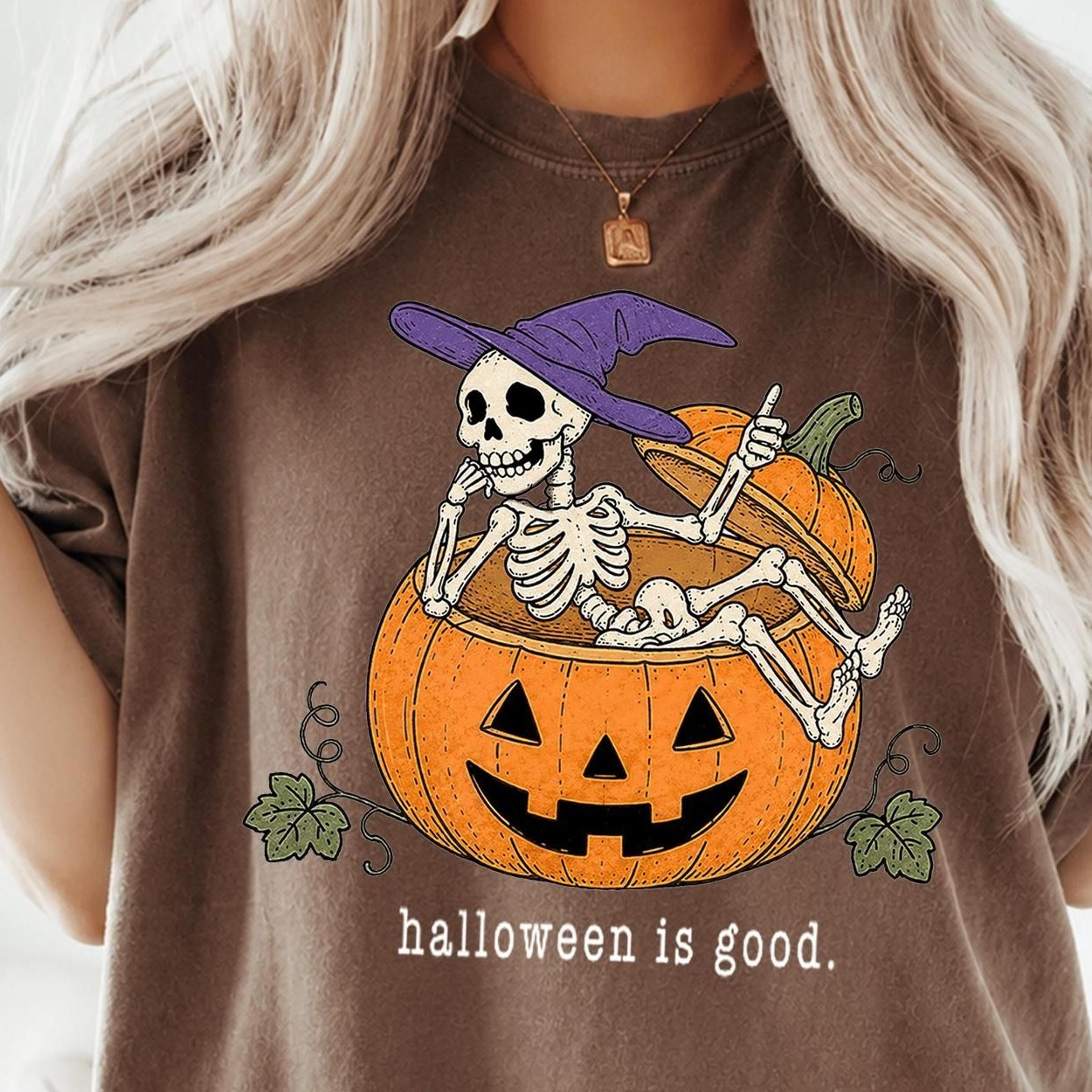 halloween is good skeleton sitting in jack o lantern pumpkin shirt, funny skeleton wearing witch hat tee,spooky pumpkin