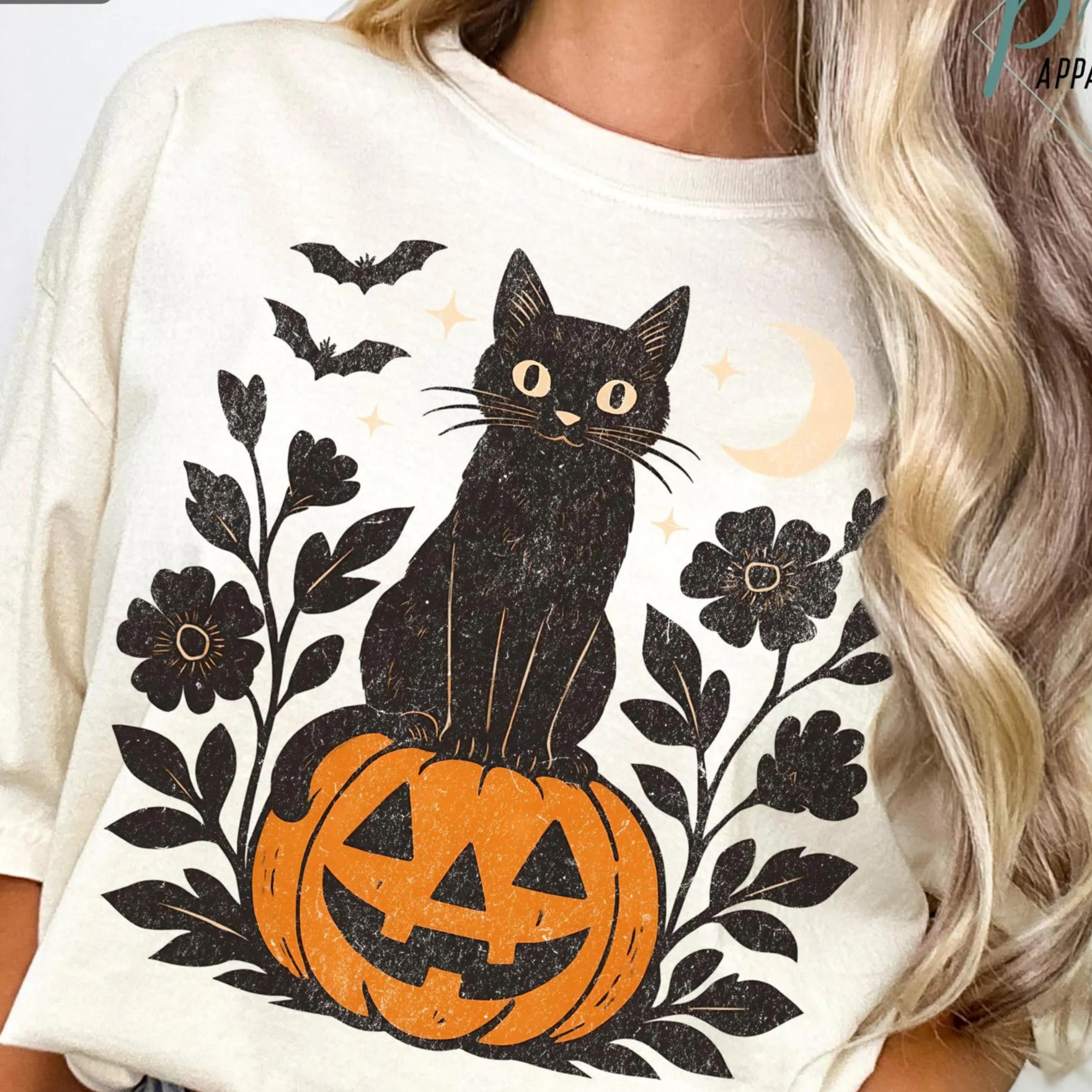 black cat on pumpkin comfort colors shirt vintage retro halloween graphic tee