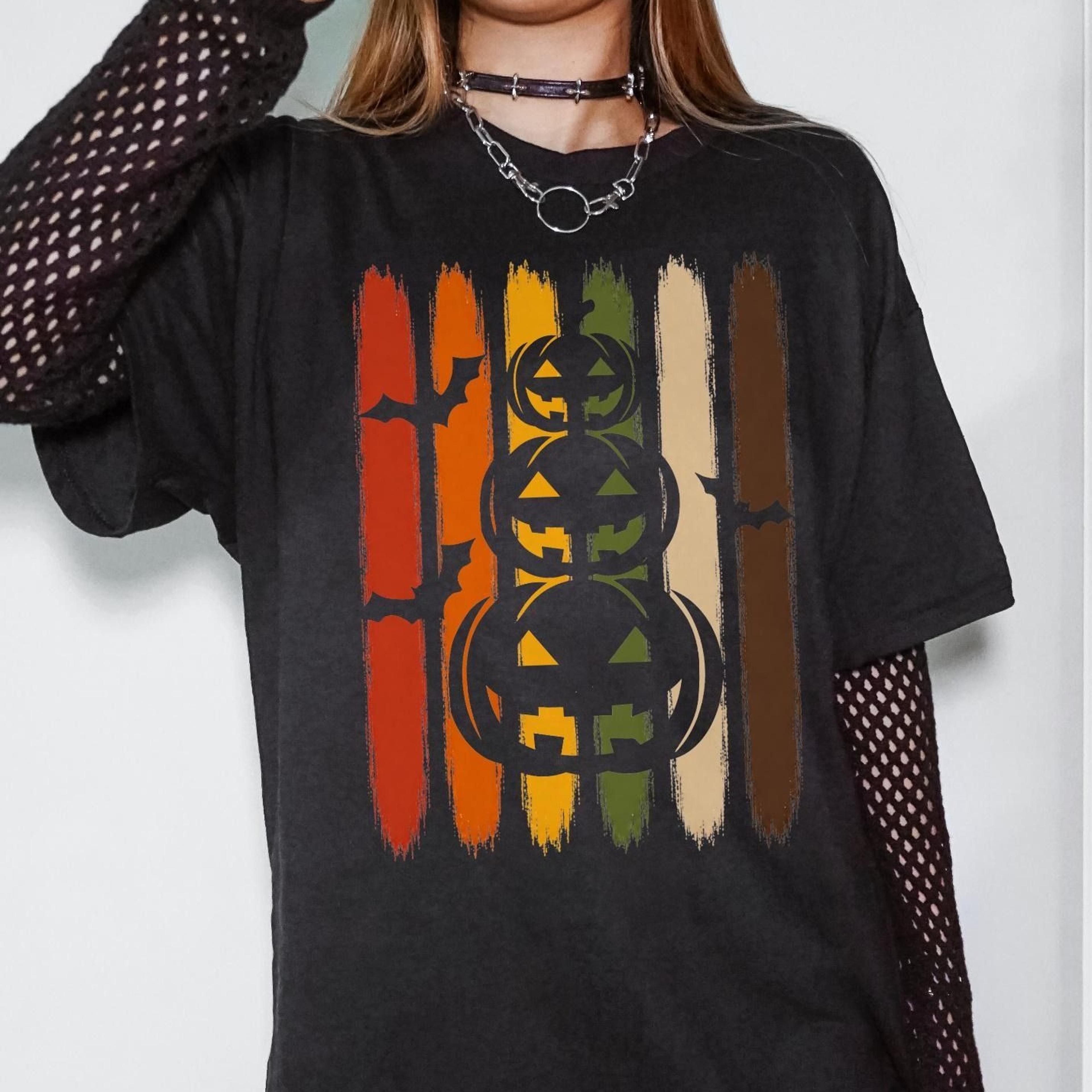 vintage halloween pumpkin bat tshirt retro 90s spooky shirt witchy cosy haunted fall shirt brushstroke stripe trendy tee