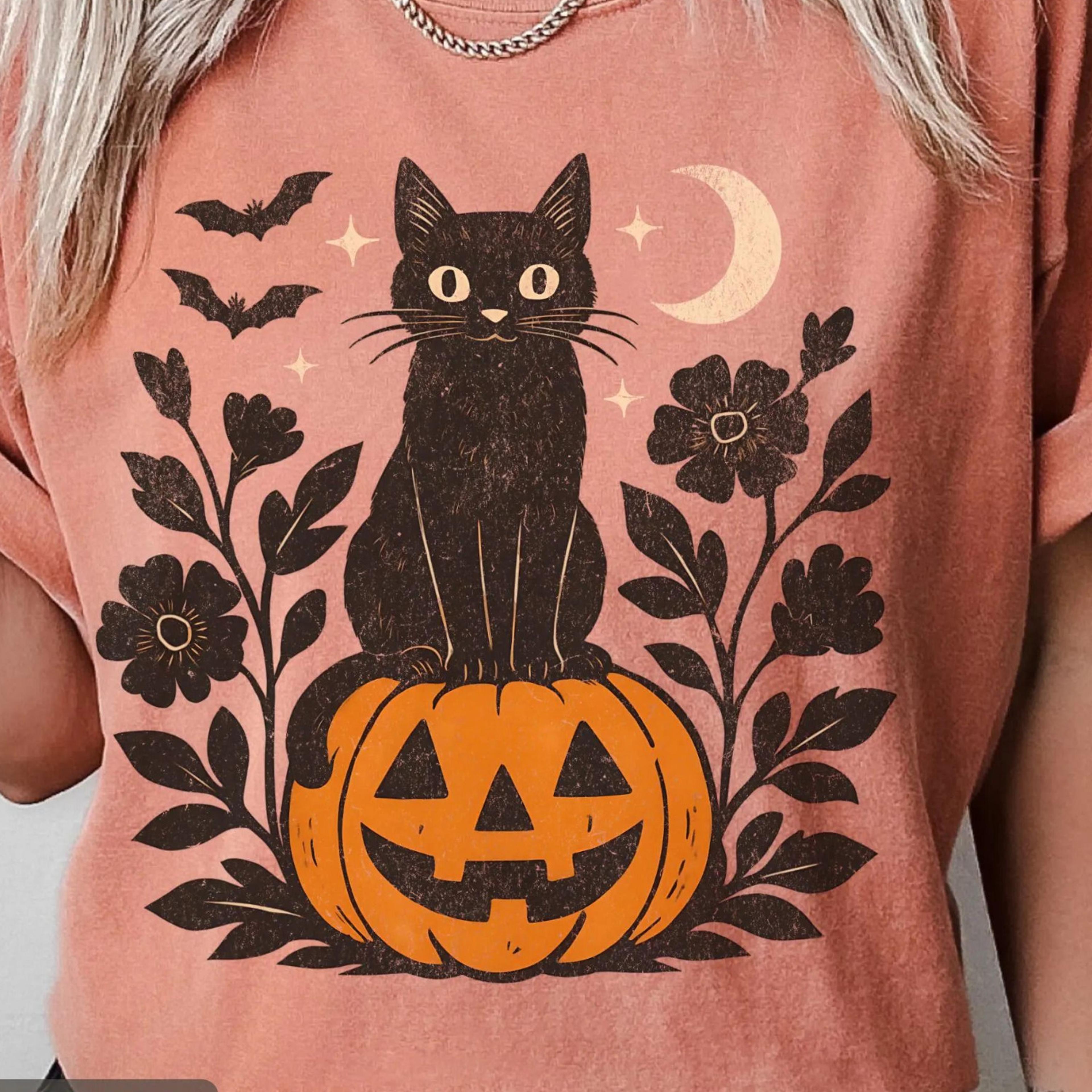 black cat on pumpkin shirt - vintage halloween graphi