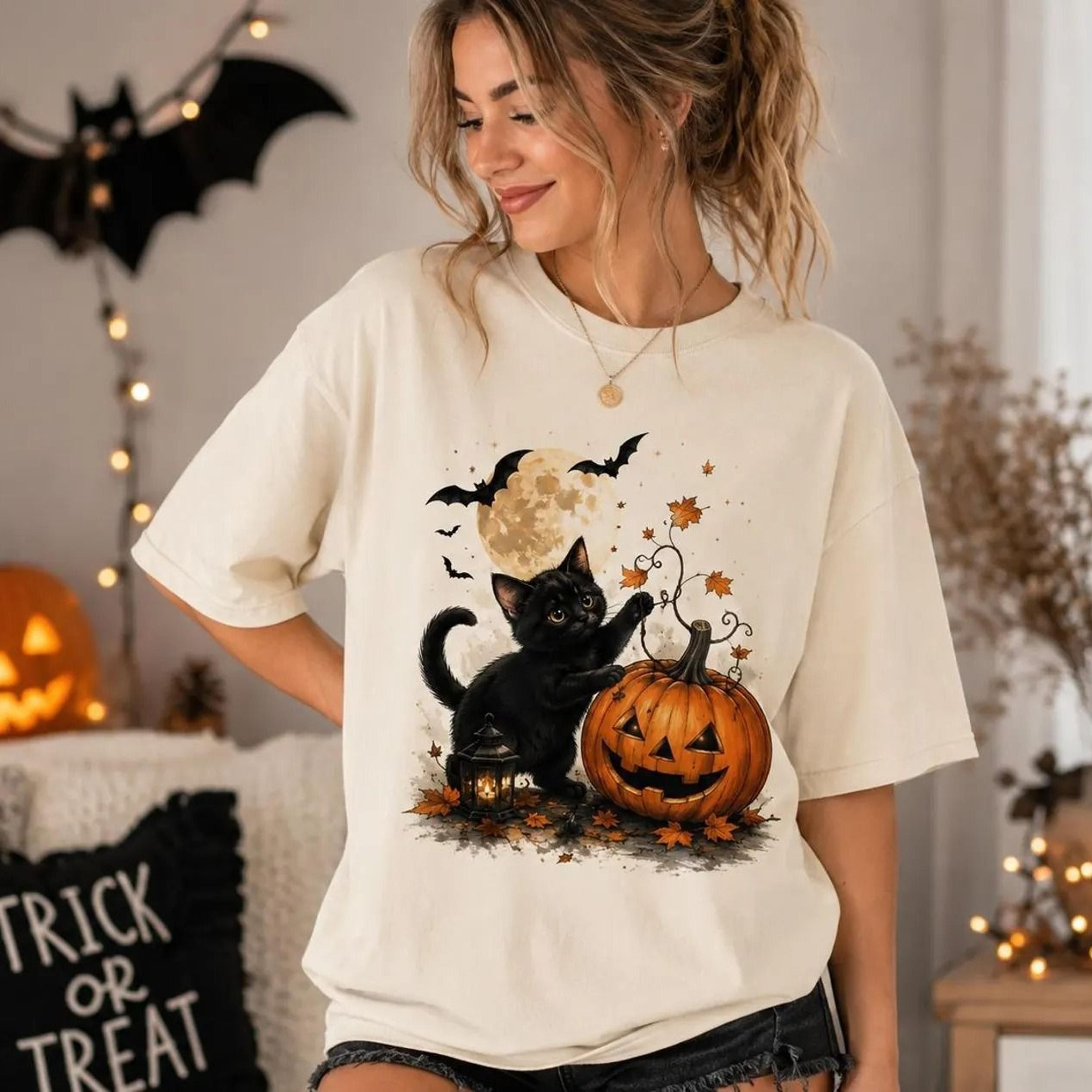 black cat halloween shirt, pumpkin cat t shirt, cute spooky kitty tee, vintage halloween graphic shirt, fall cat lover g