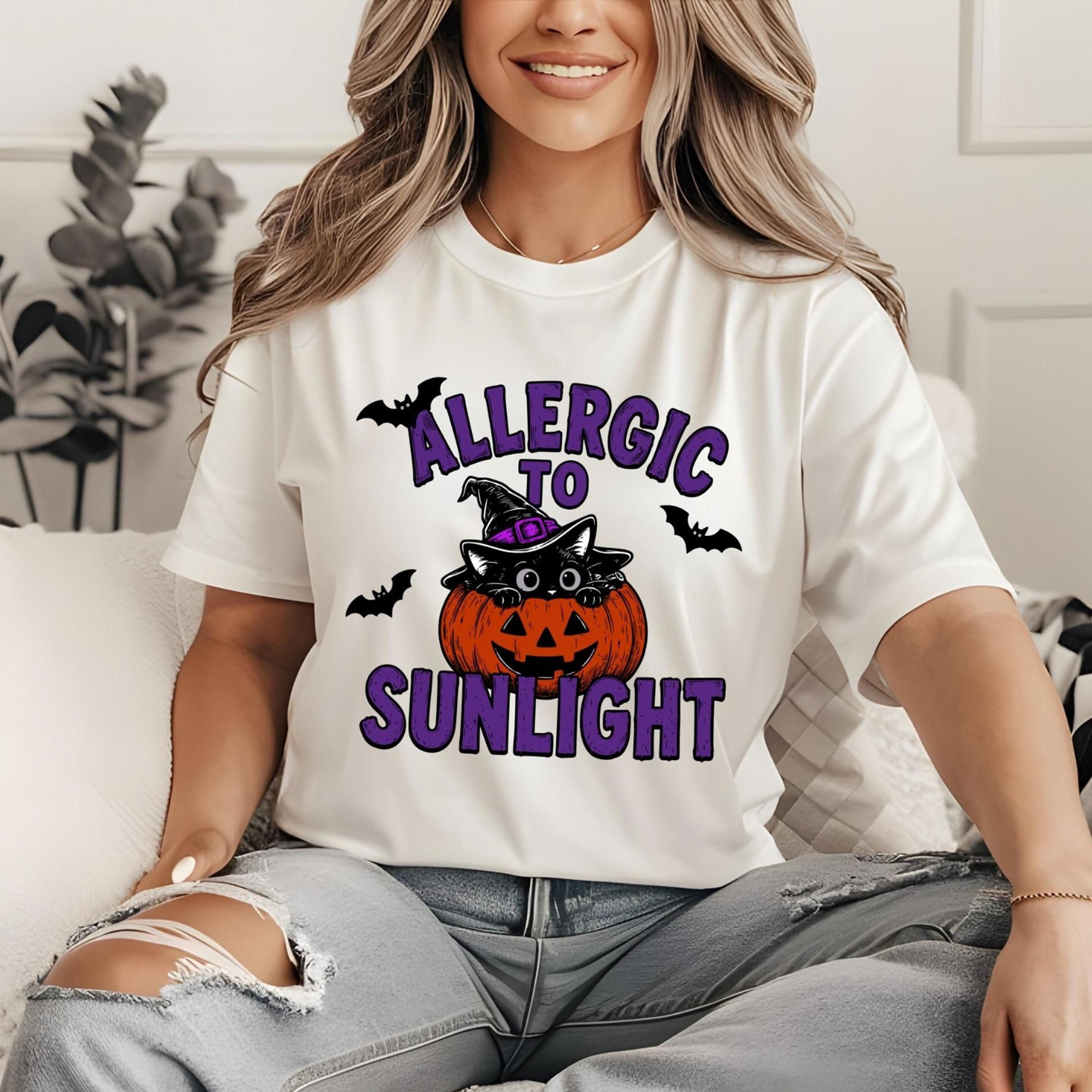 allergic to sunlight halloween cat shirt, cute black cat pumpkin tee, funny spooky season t-shirt, witch cat graphic tee