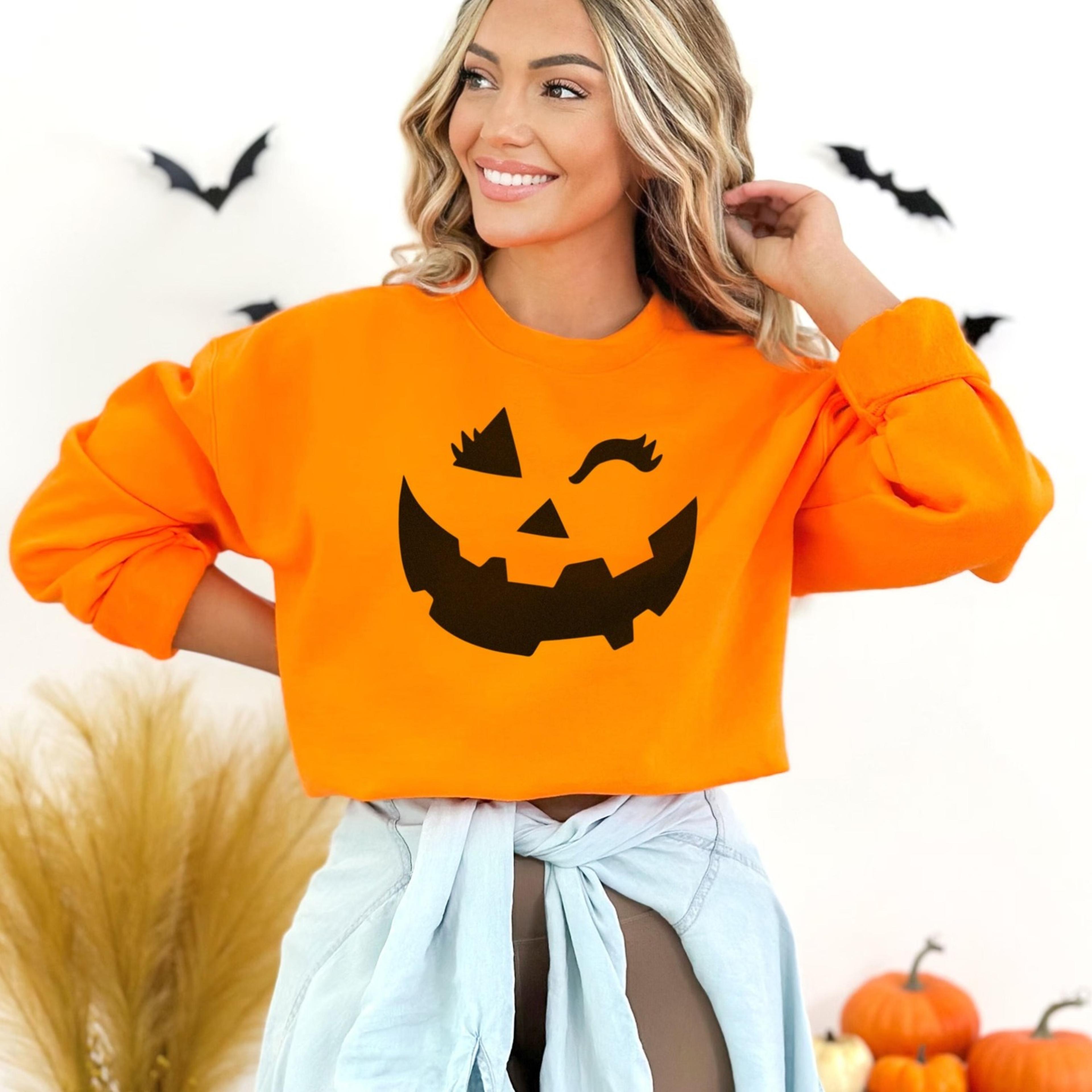 orange pumpkin face sweatshirt - halloween winking pumpkin shirt