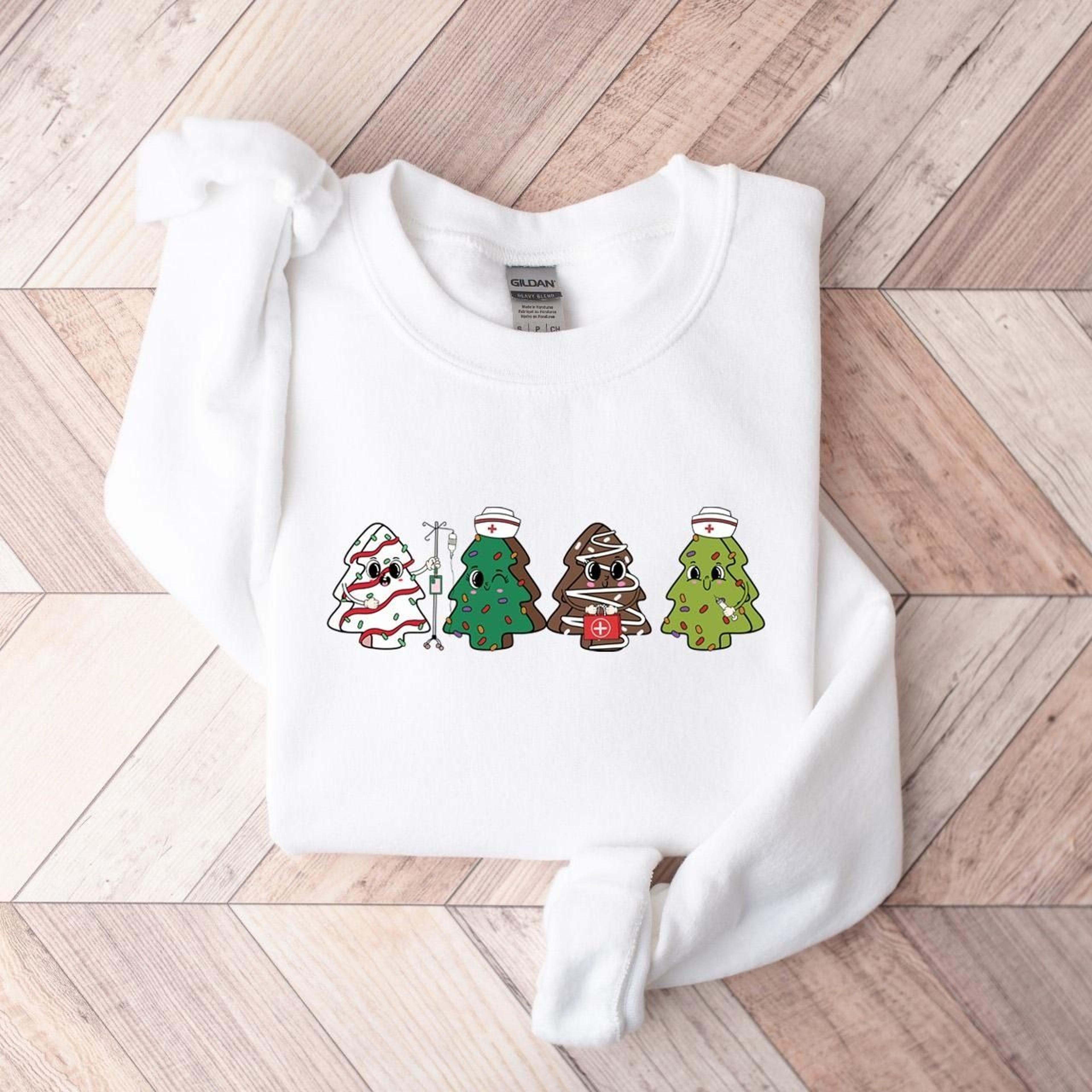 nurse christmas tree cake sweatshirt, nursing christmas sweater, emergency christmas shirt, christmas nurse gift, rn chr