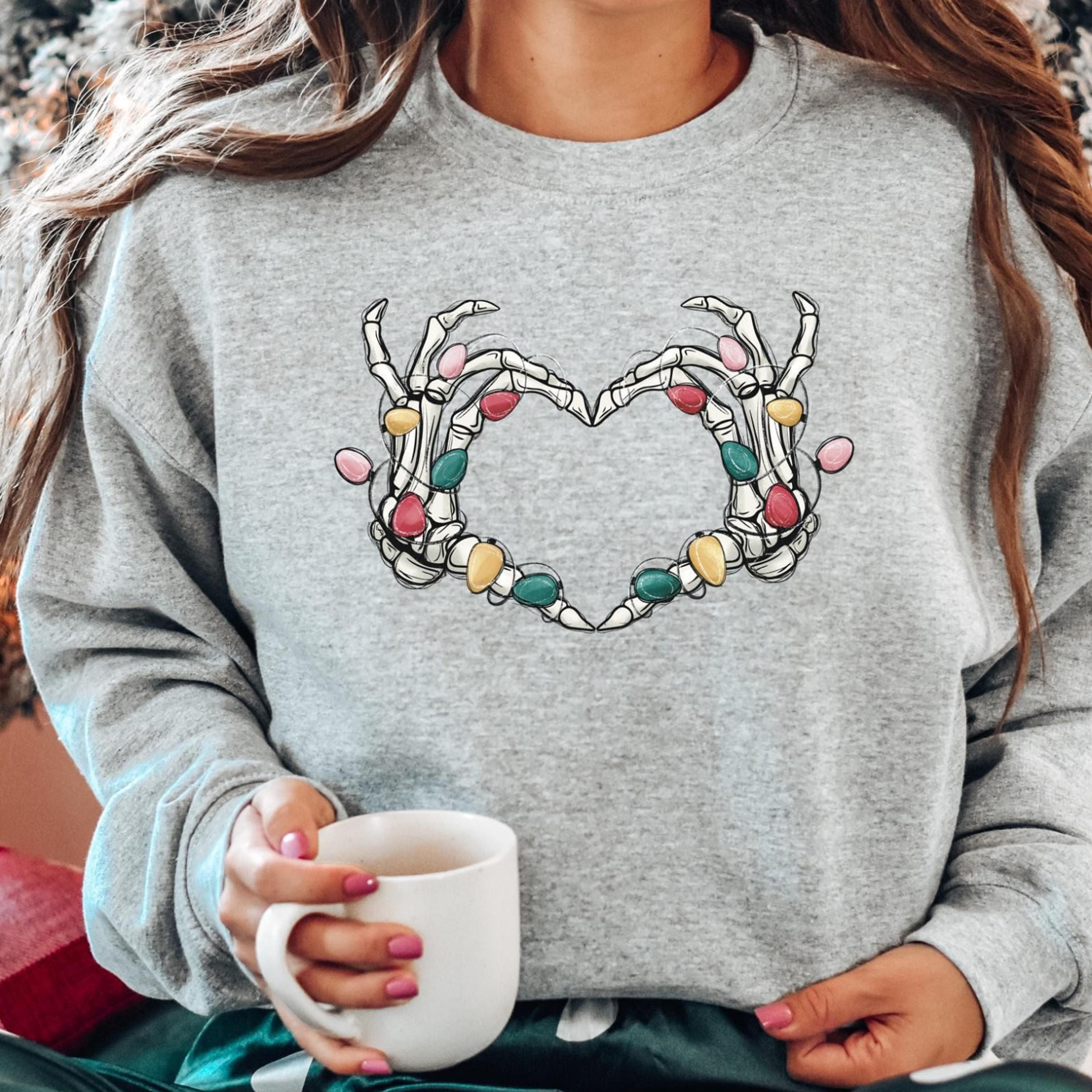 skeleton hands heart christmas sweatshirt, christmas lights shirt, christmas shirt, spooky christmas shirt,