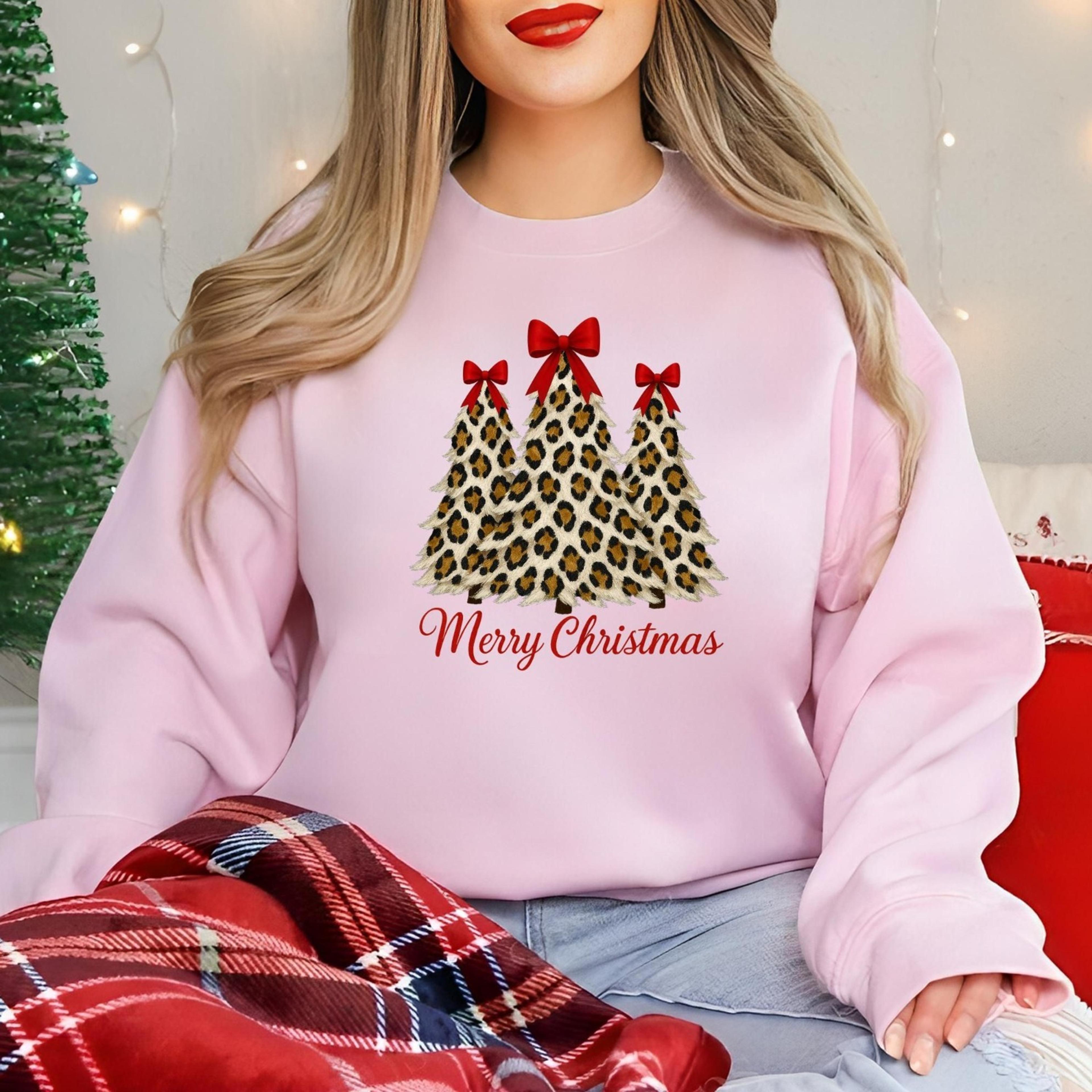 leopard christmas tree sweatshirt, coquette bow tree jumper, trendy holiday crewneck top, cute festive winter sweater, x