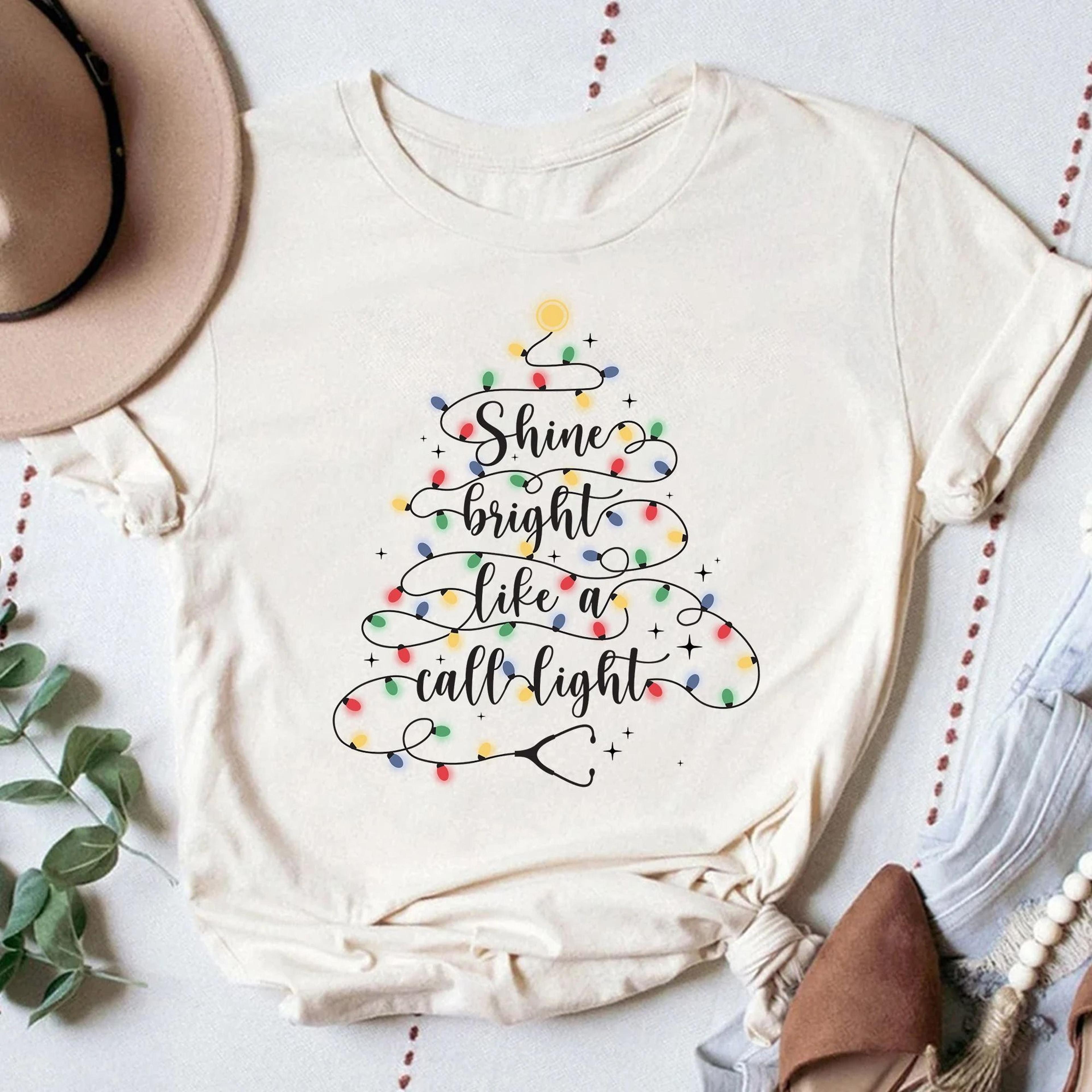 funny nurse christmas shirt shine bright like a call light"