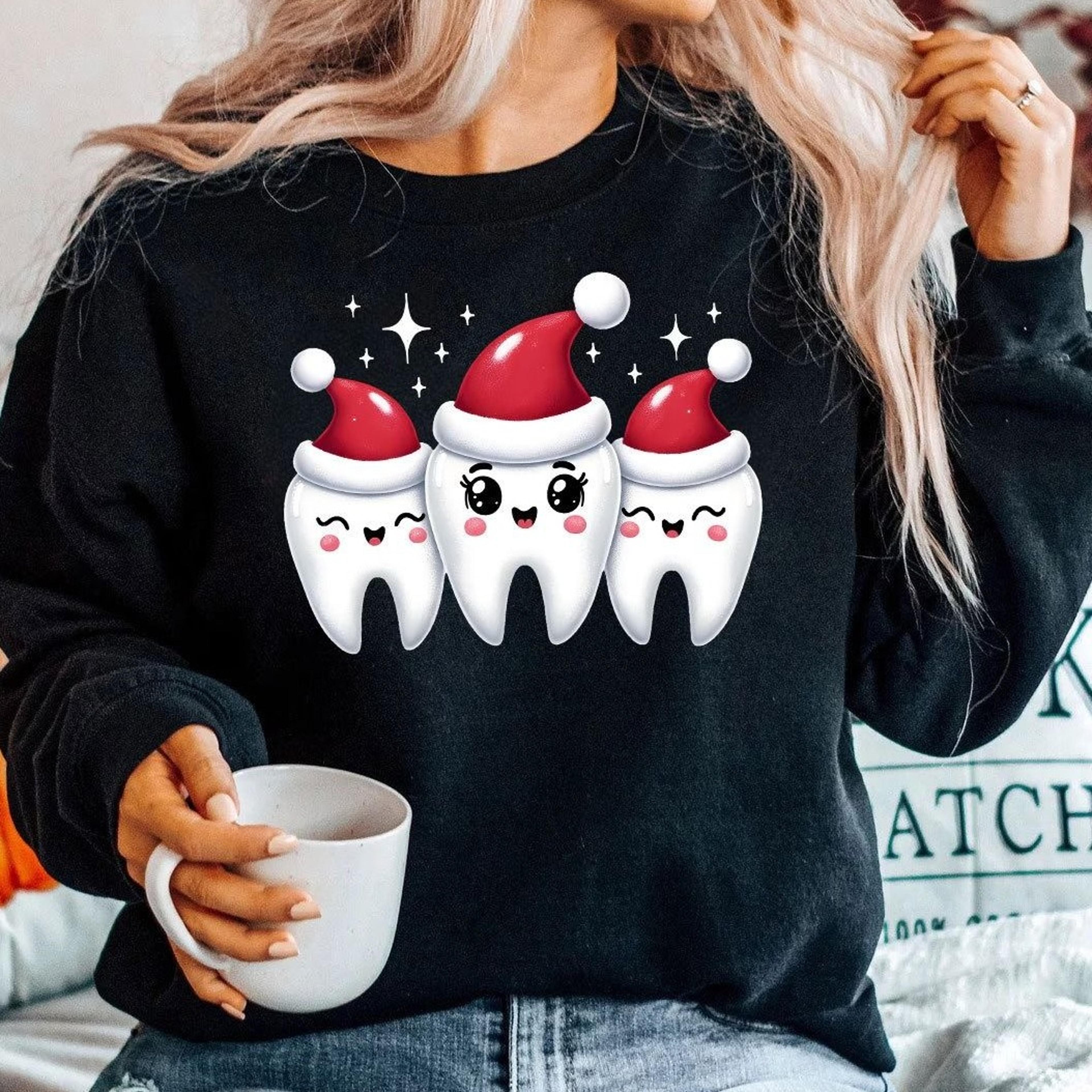 funny christmas dental sweatshirt, trio of joyful teeth with santa hats, cute dental hygienist christmas sweater, dentis