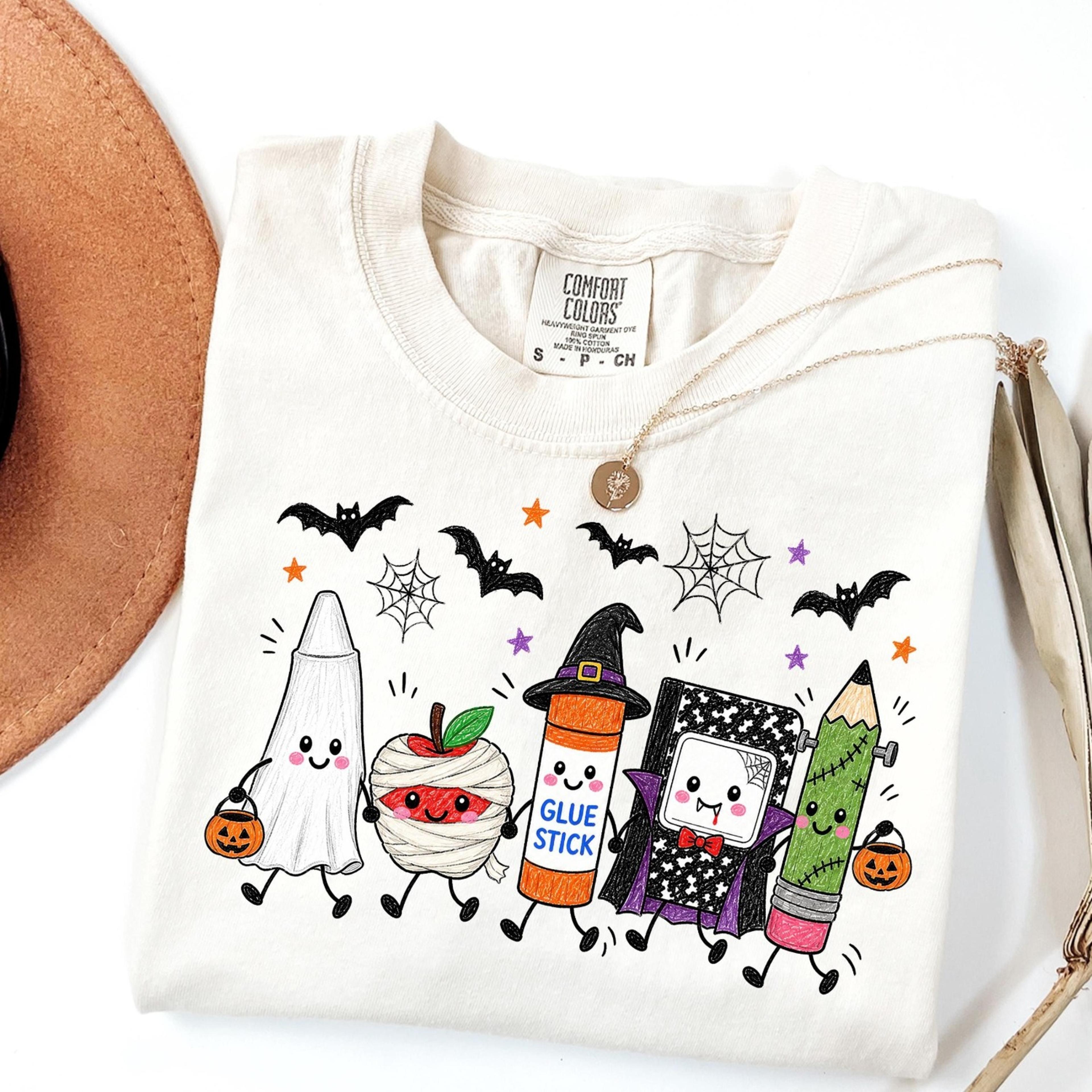 halloween teacher shirt, spooky school supplies graphic shirt, cute ghost classroom apparel, back to school teacher gift