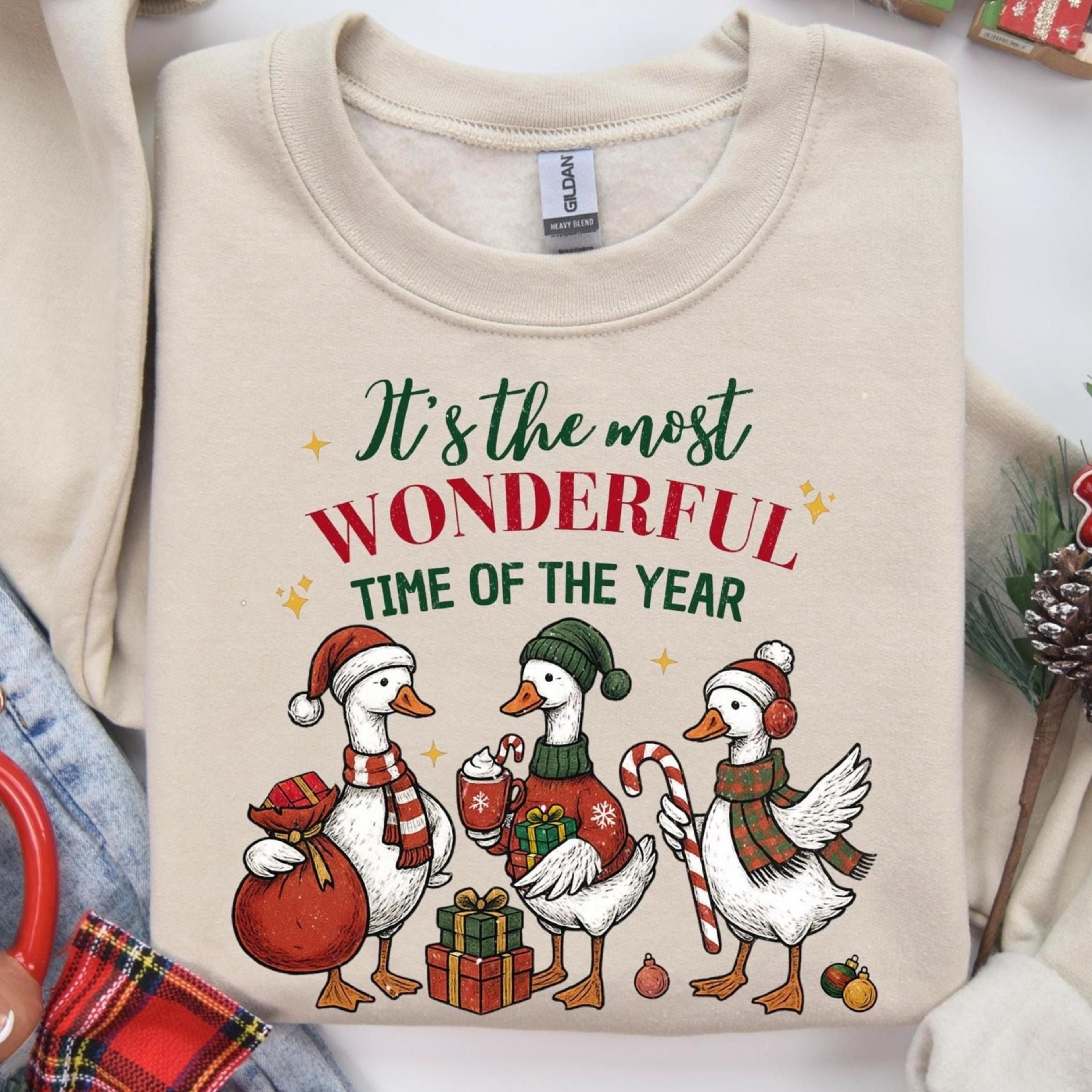 christmas sweatshirt with geese, festive christmas bow and winter details – original merry christmas sweater