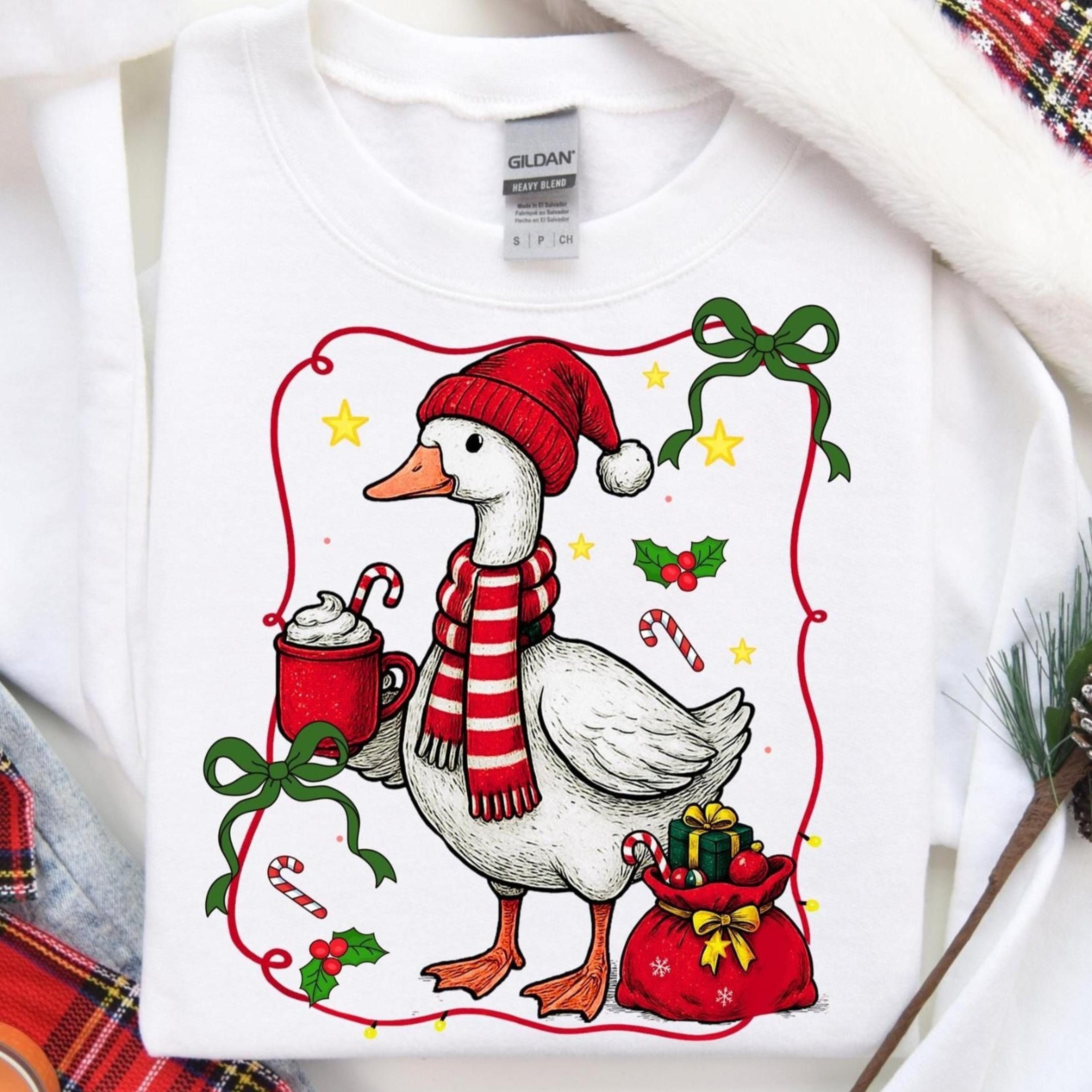 cute christmas sweatshirt with goose, festive christmas bow and winter details – original merry christmas sweater