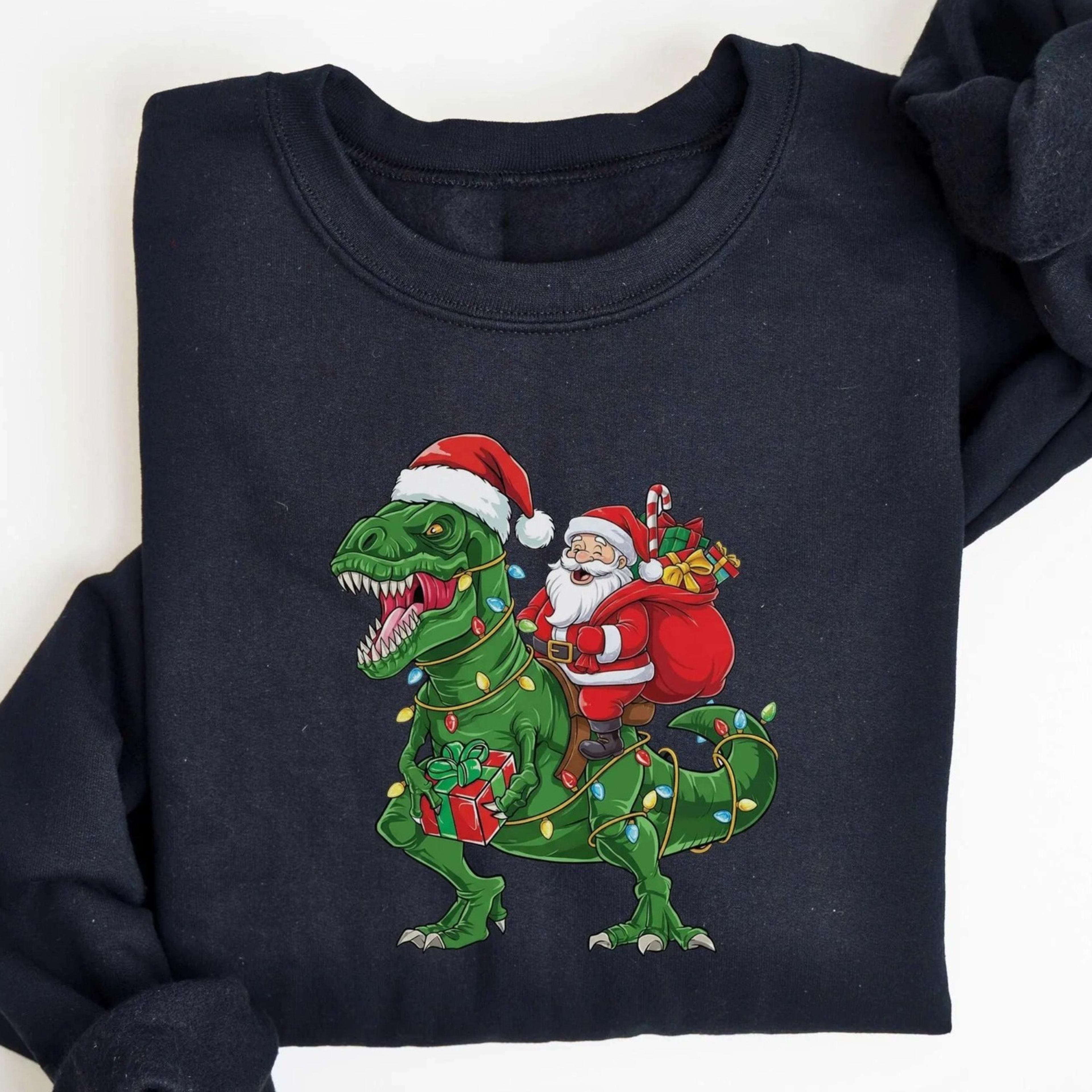 dinosaur santa claus christmas sweatshirt, funny t rex xmas shirt, holiday dino lover hoodie, cute kids christmas gift