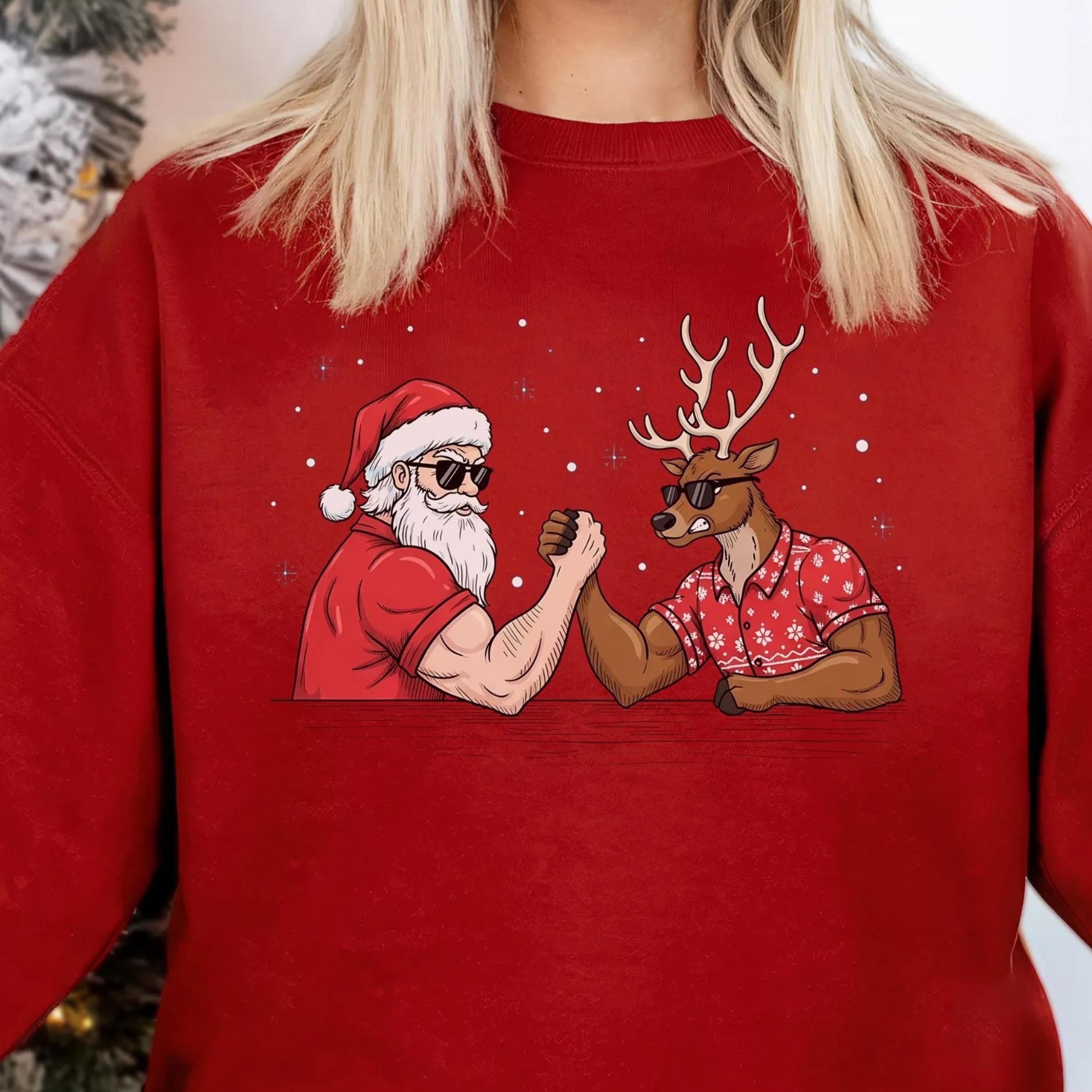 santa claus and reindeer arm wrestling christmas sweatshirt, arm wrestling xmas sweater, sporty christmas shirt