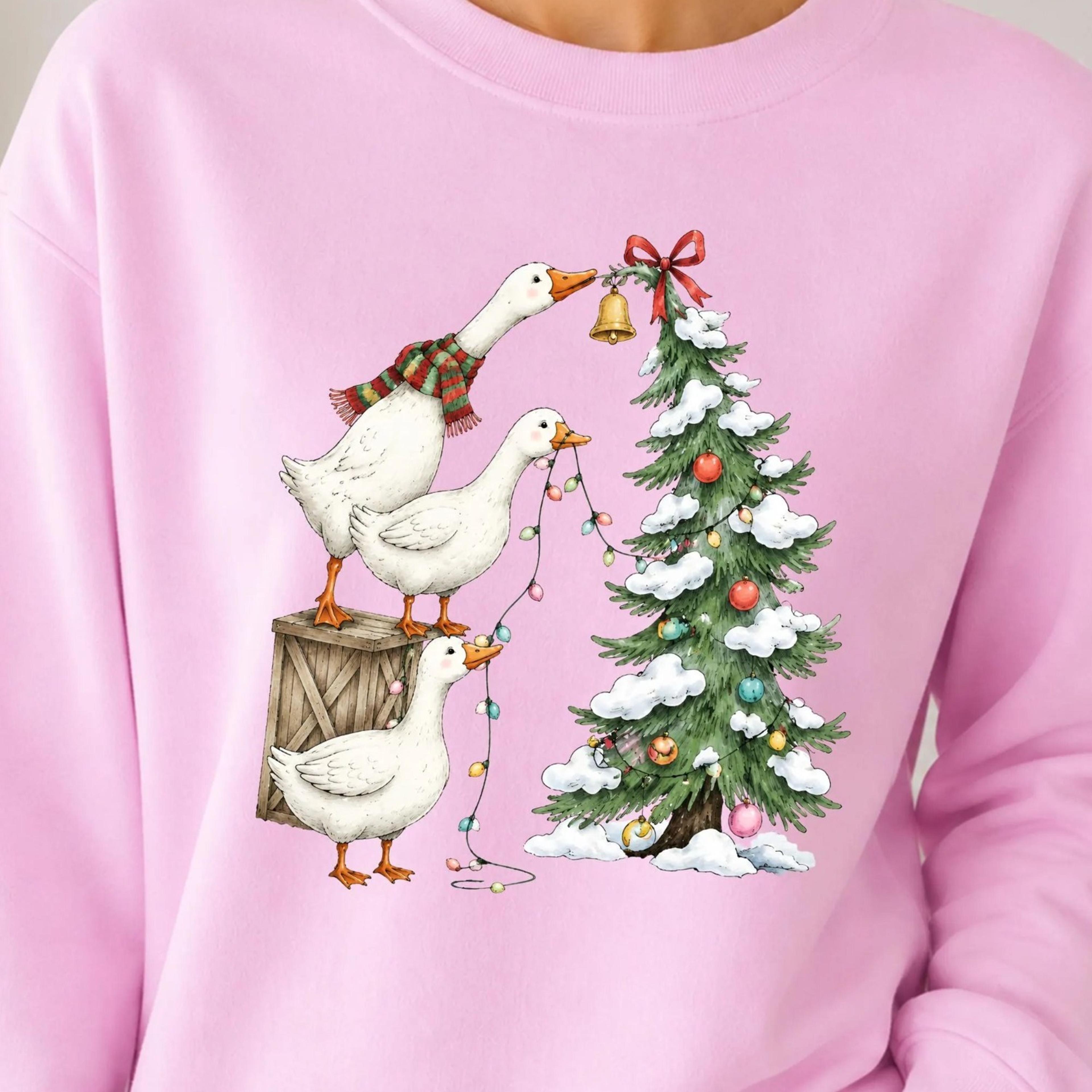funny christmas goose sweatshirt, geese decorating christmas tree