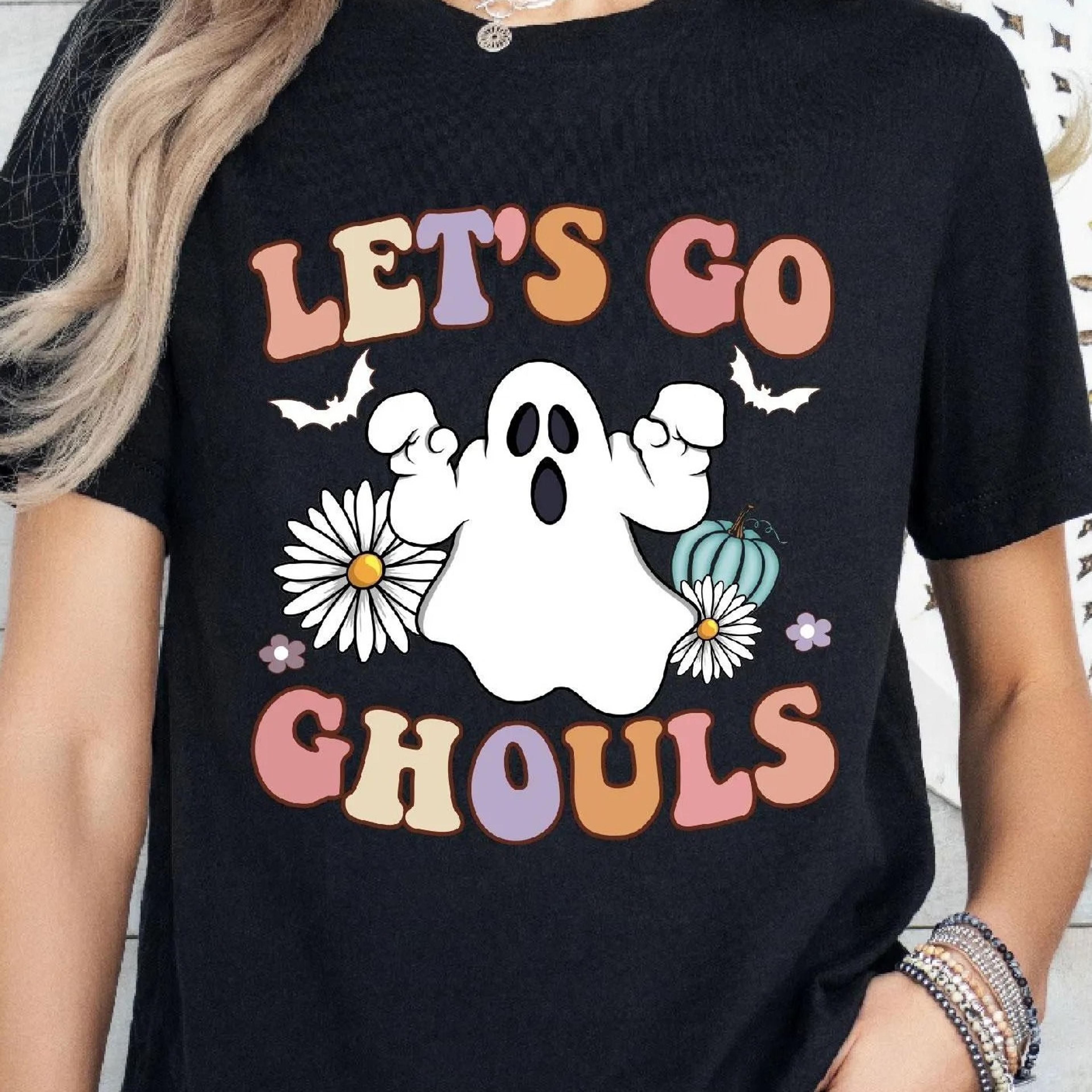 let's go ghouls tee, ghost daisy pumpkin tee, spooky halloween, bat floral graphic, daisy flower