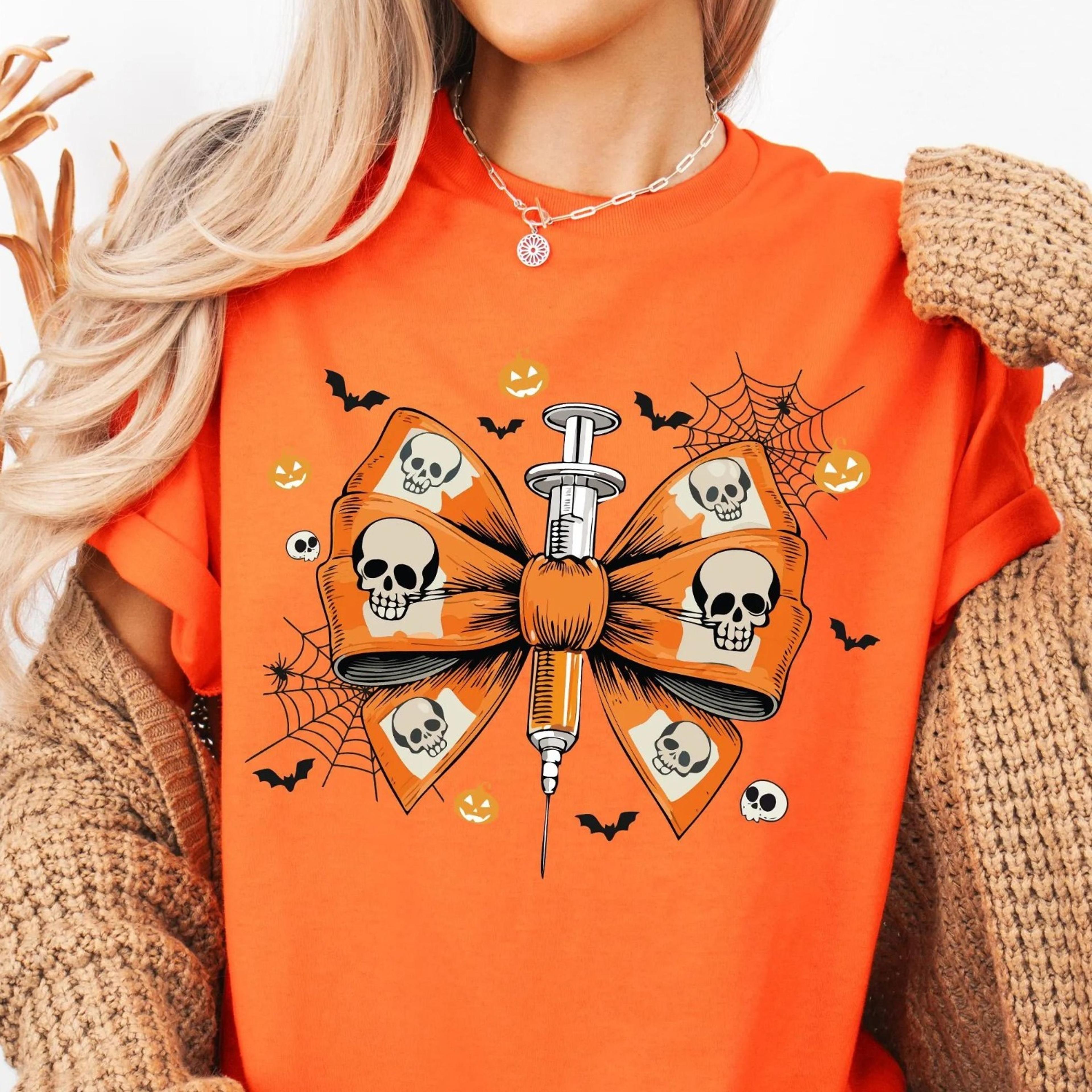 halloween nurse bow shirt, fall coquette bow nurse shirt, spooky nurse shirt, funny icu nurse sweater