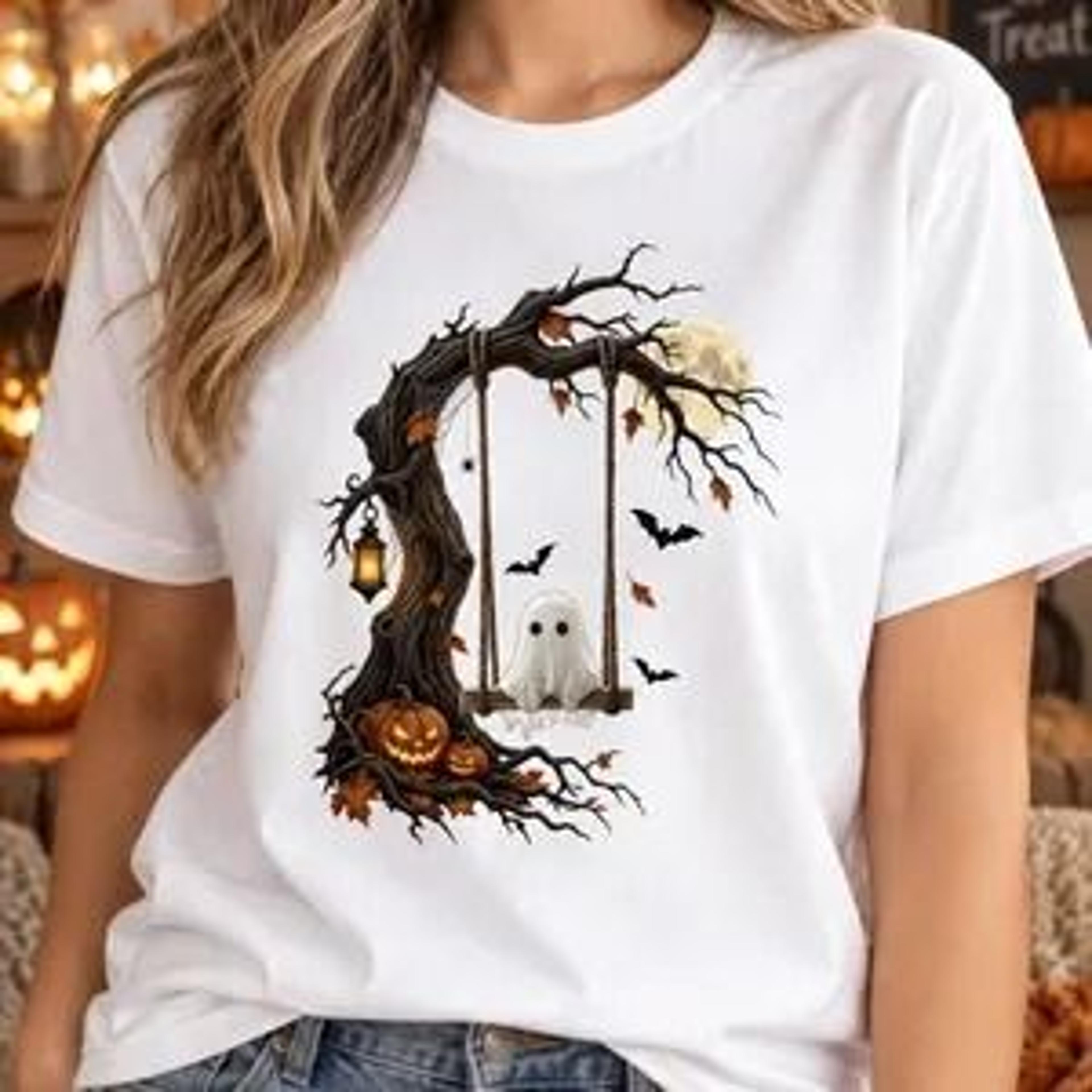 ghost on swing halloween shirt, cute ghost shirt, spooky season tee, pumpkin ghost graphic, haunted tree halloween tee