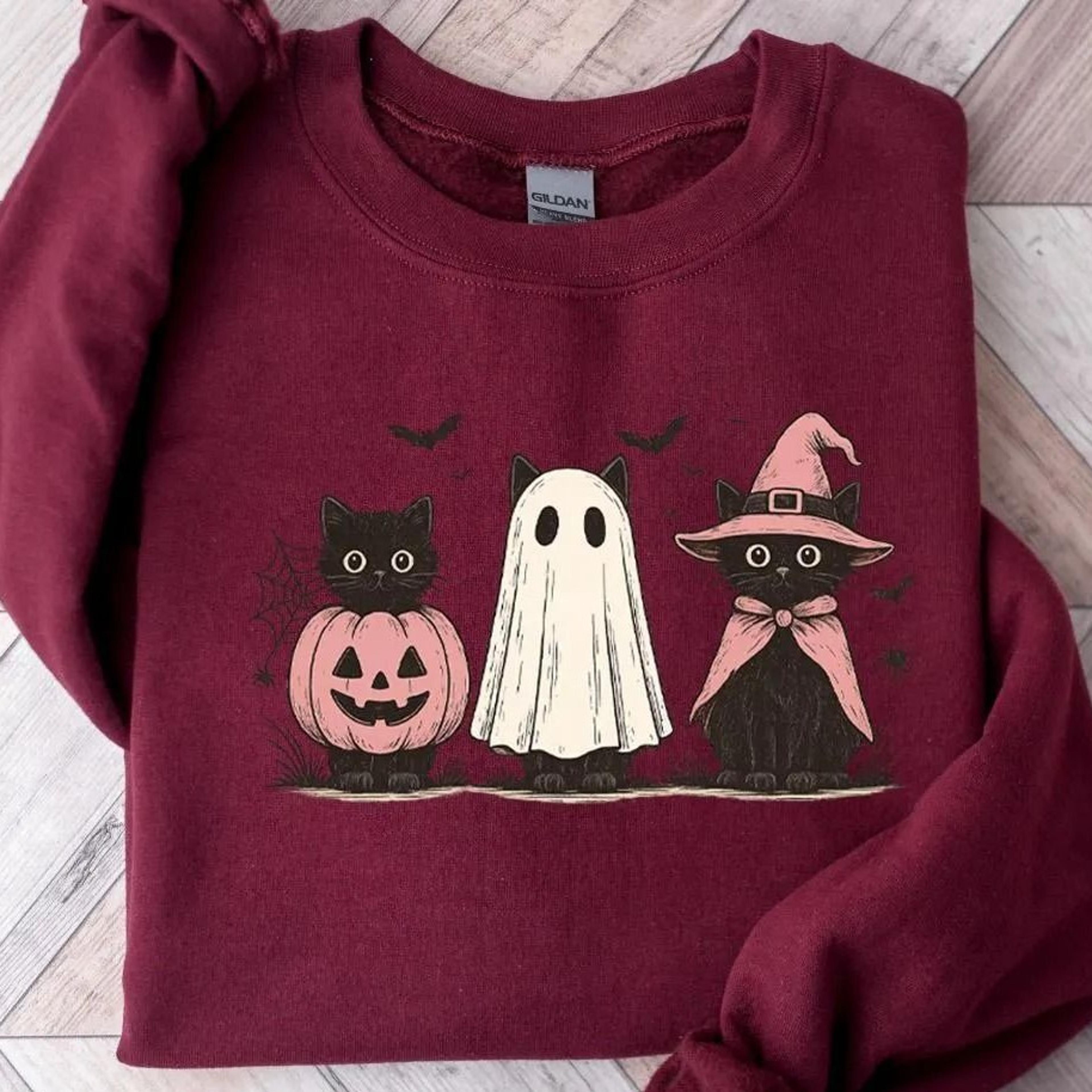 ghost holding black cat sweatshirt, ghost cat halloween hoodie, halloween gift for cat owners