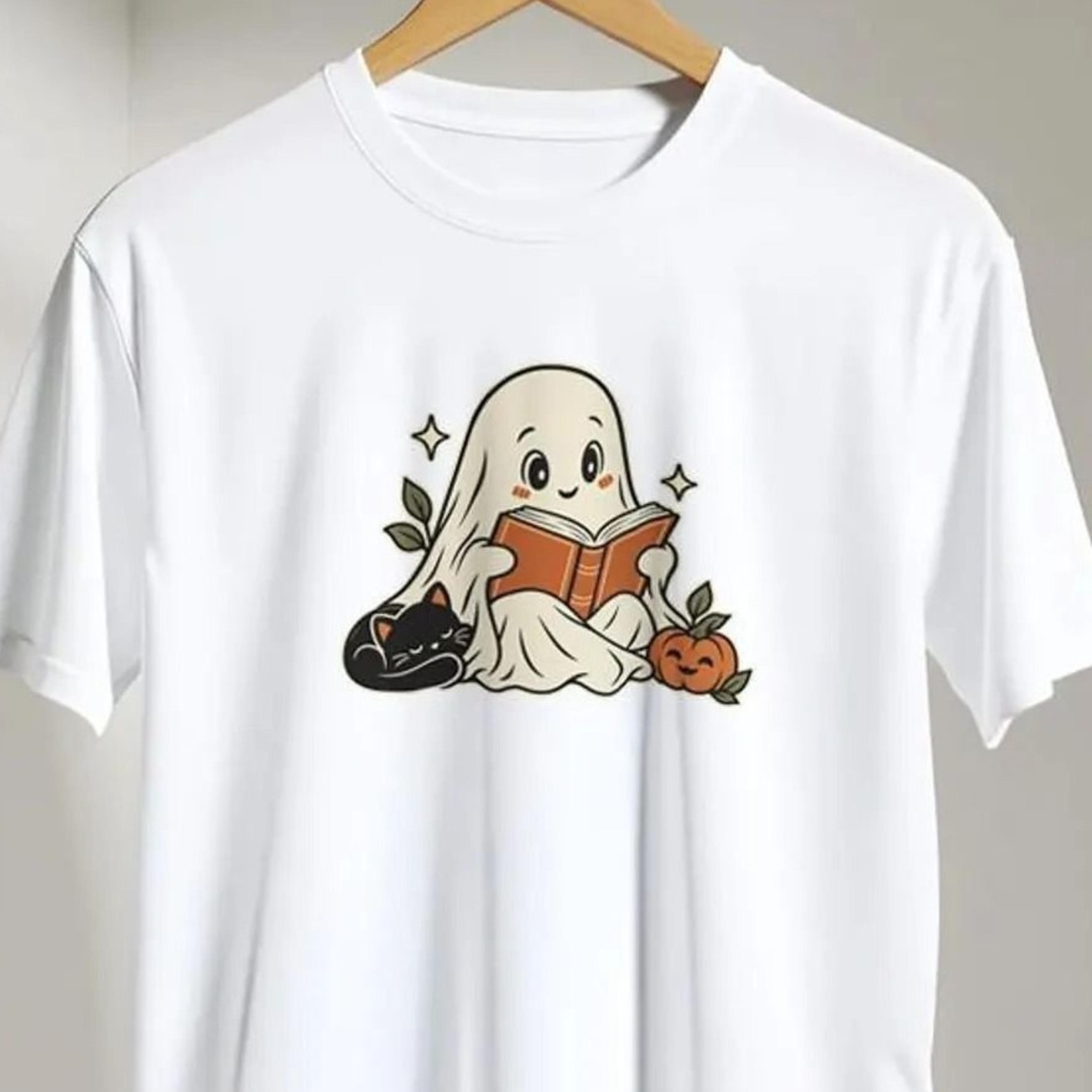 cozy ghost reading t-shirt – cute halloween graphic tee in retro autumn colors for book lovers