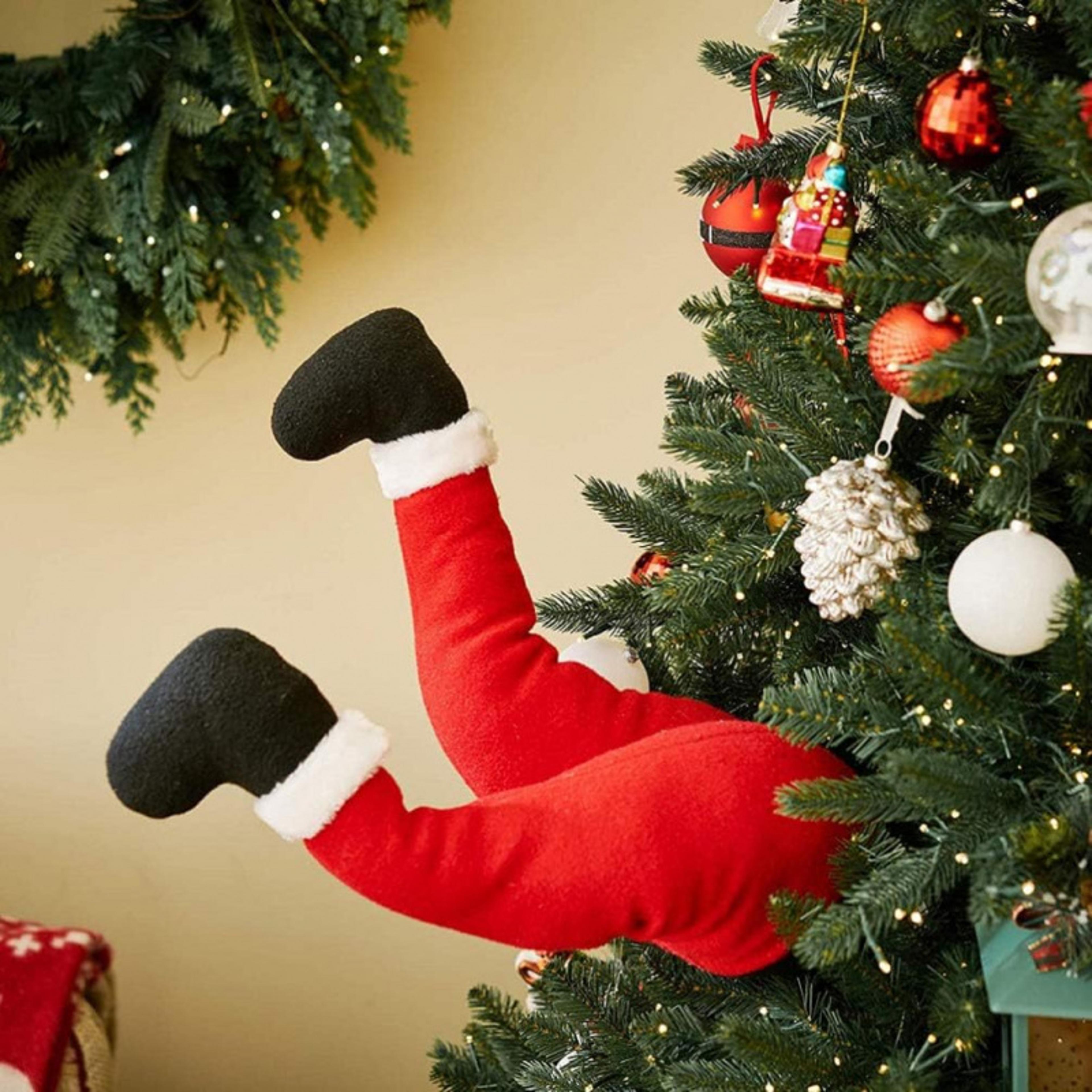 filled christmas tree topper, christmas santa leg decorations, holiday party fireplace ornaments