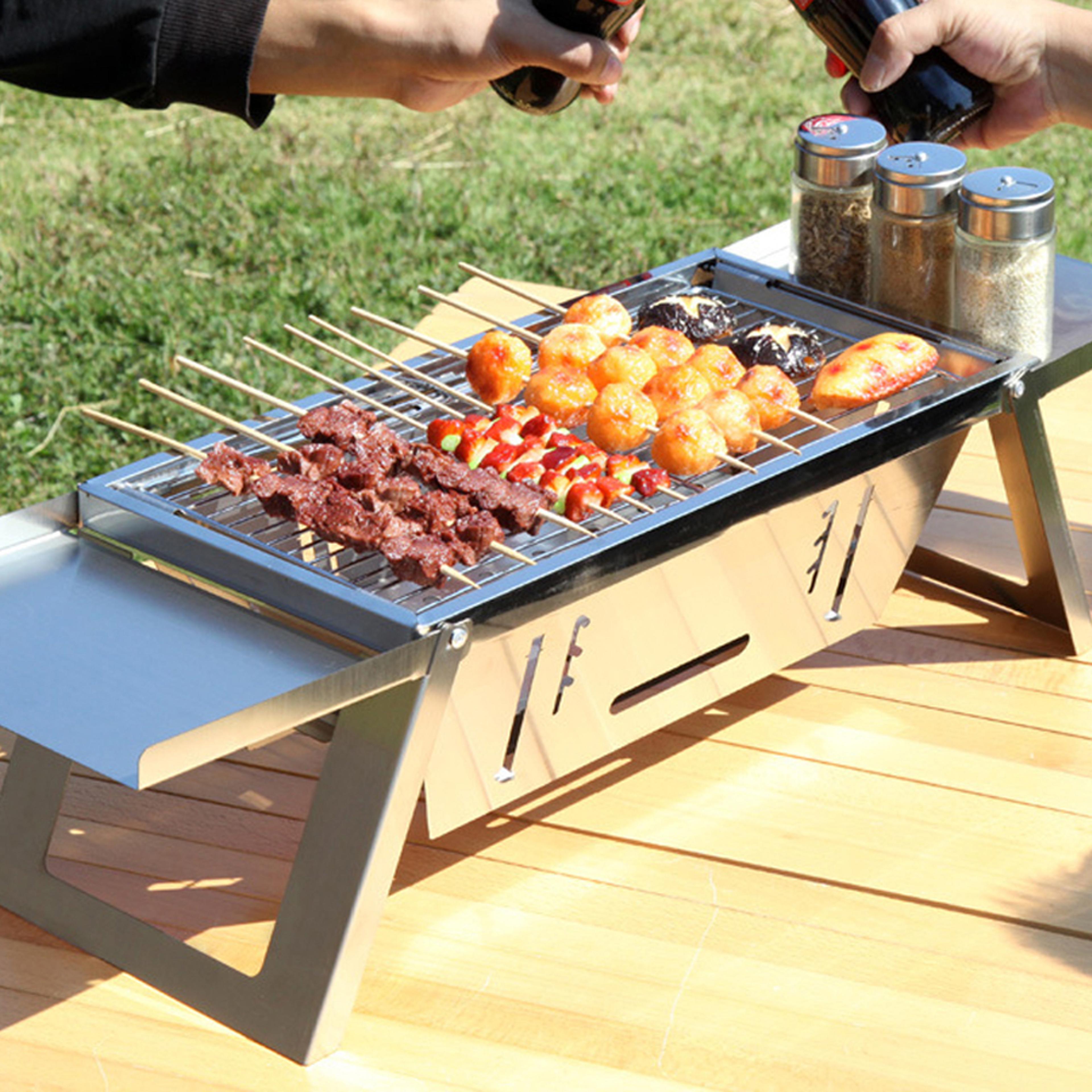 portable camping bbq grill with adjustable height, folding stainless steel charcoal stove & carry bag