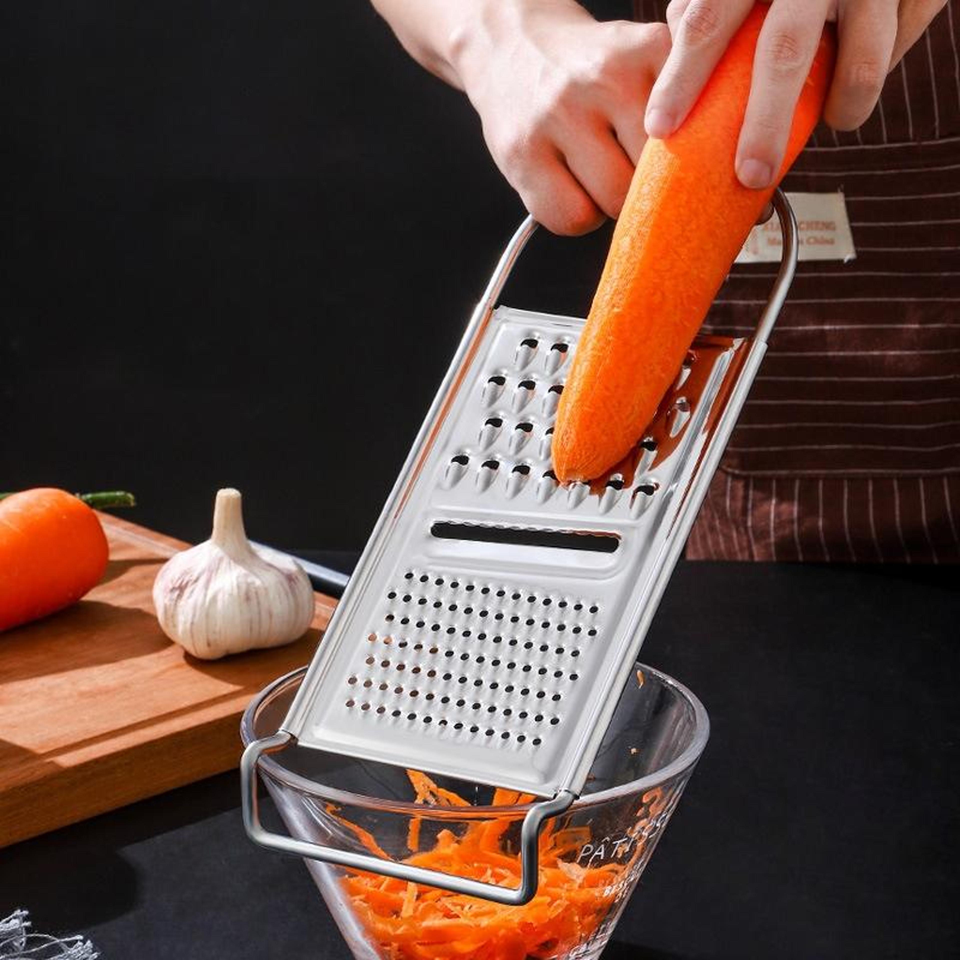 curved stainless steel vegetable cutter and potato grater peeler