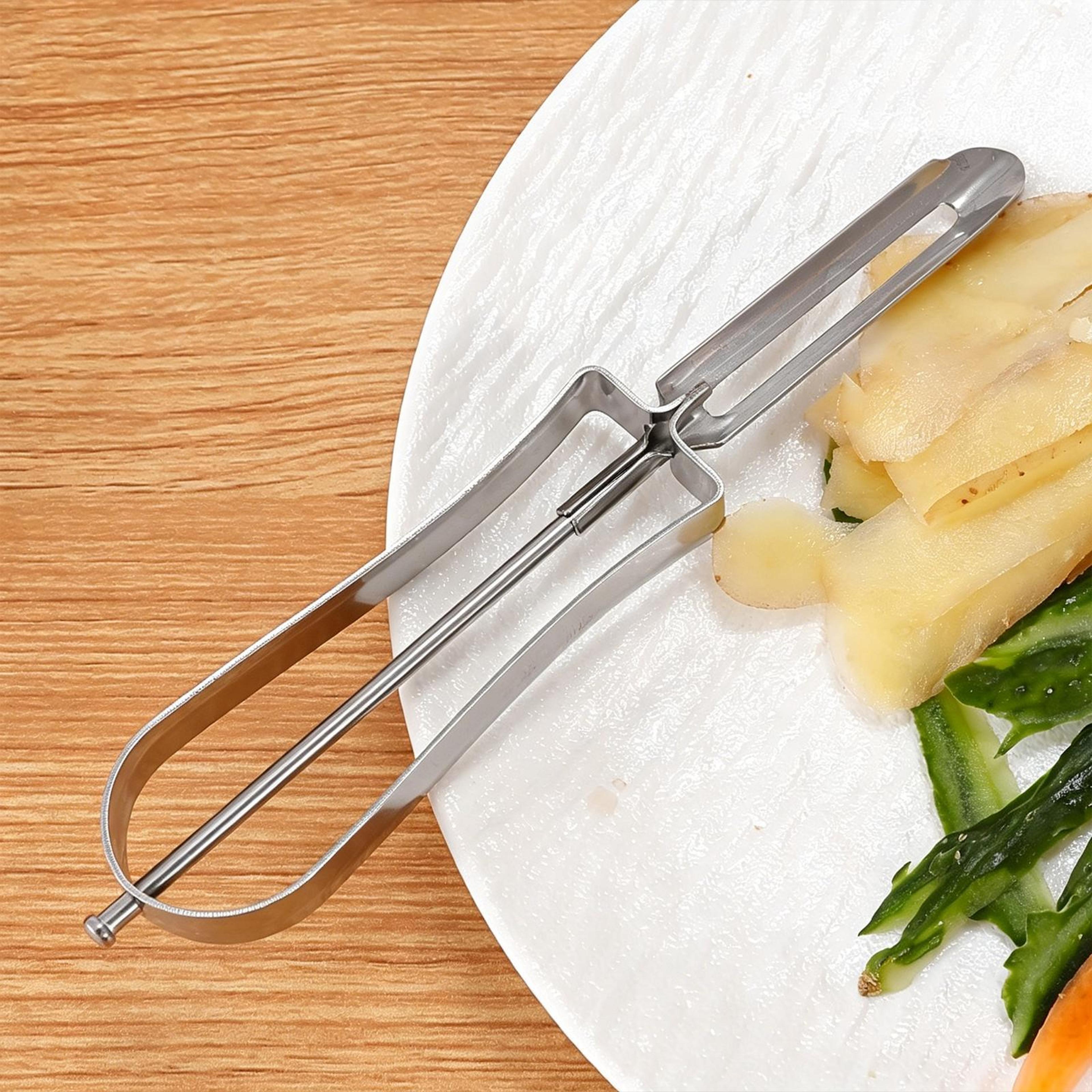 stainless steel vegetable peeler and fruit slicer with ergonomic grip