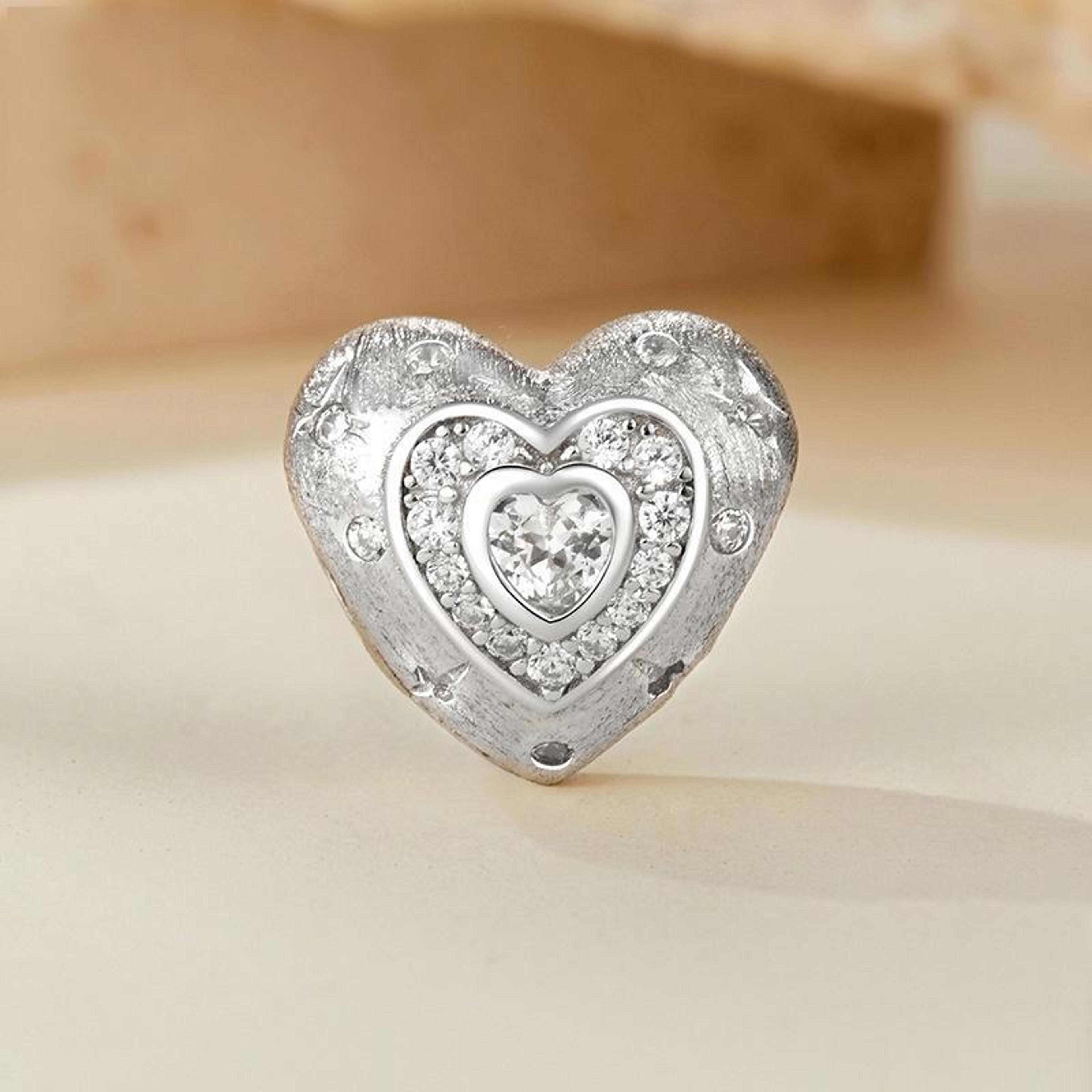 sterling silver heart charm bead with platinum plating and sparkling zircon accents