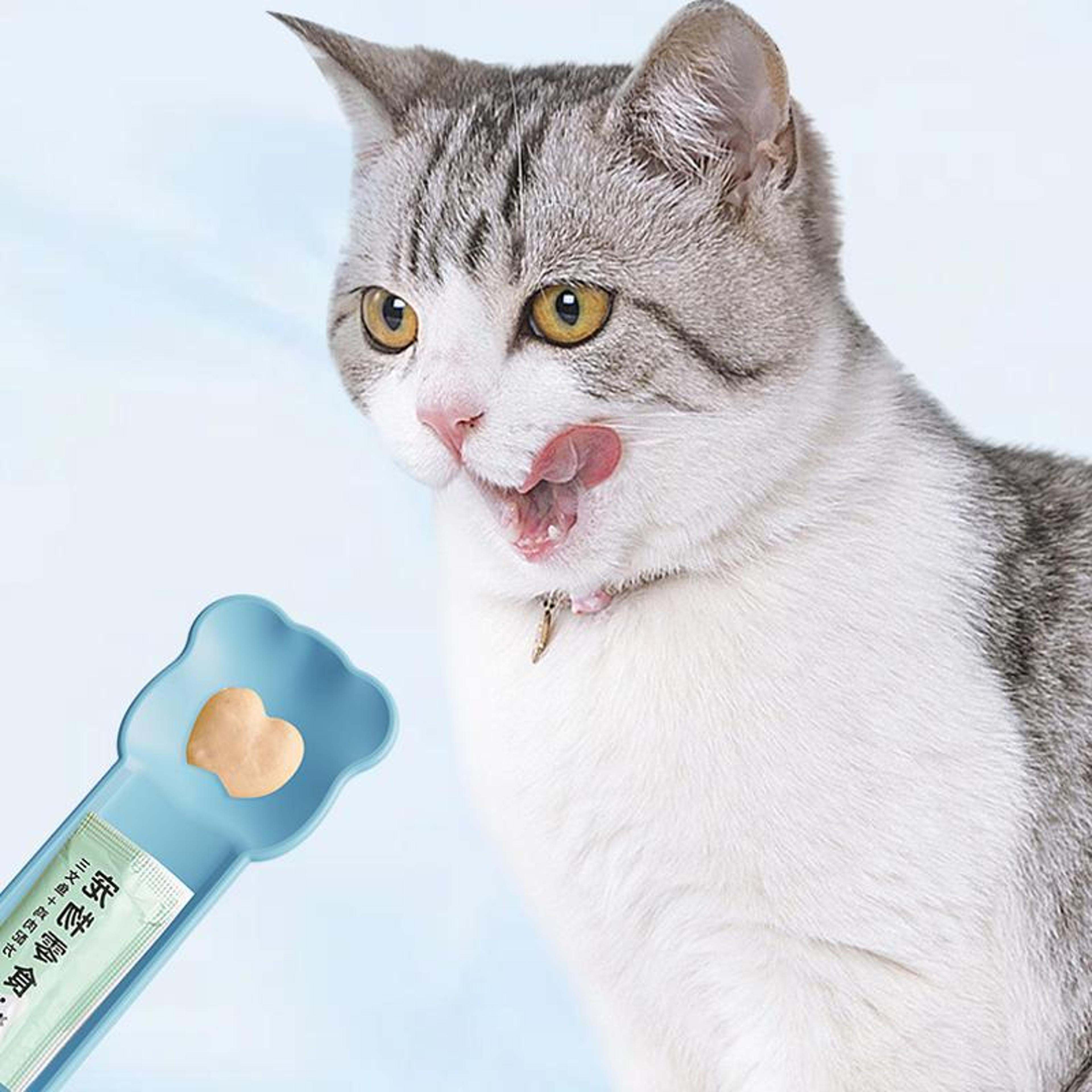 premium cat snack dispenser and easy squeeze pet treat feeder tool