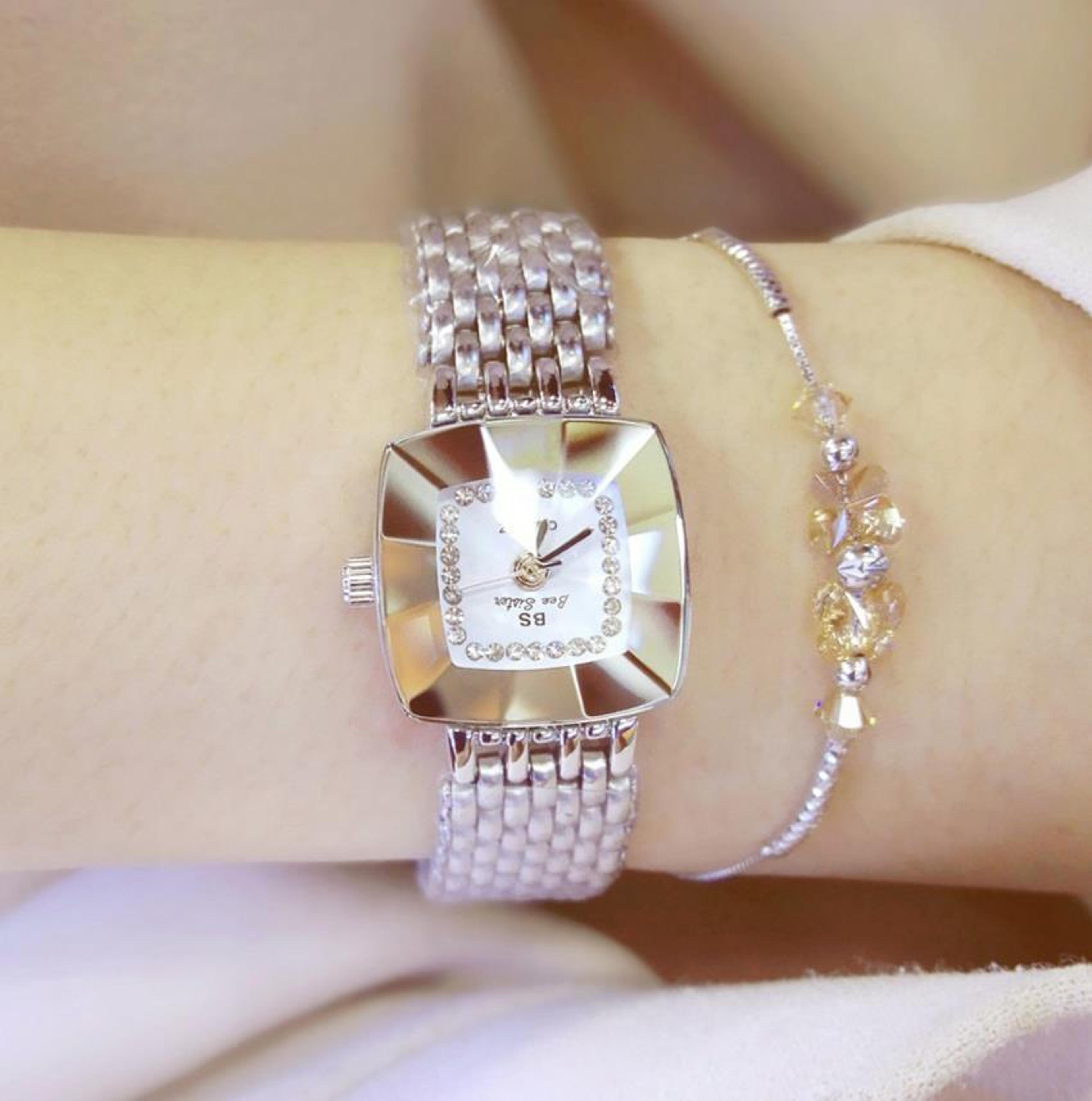 elegant women's square watch with stainless steel strap and quartz movement