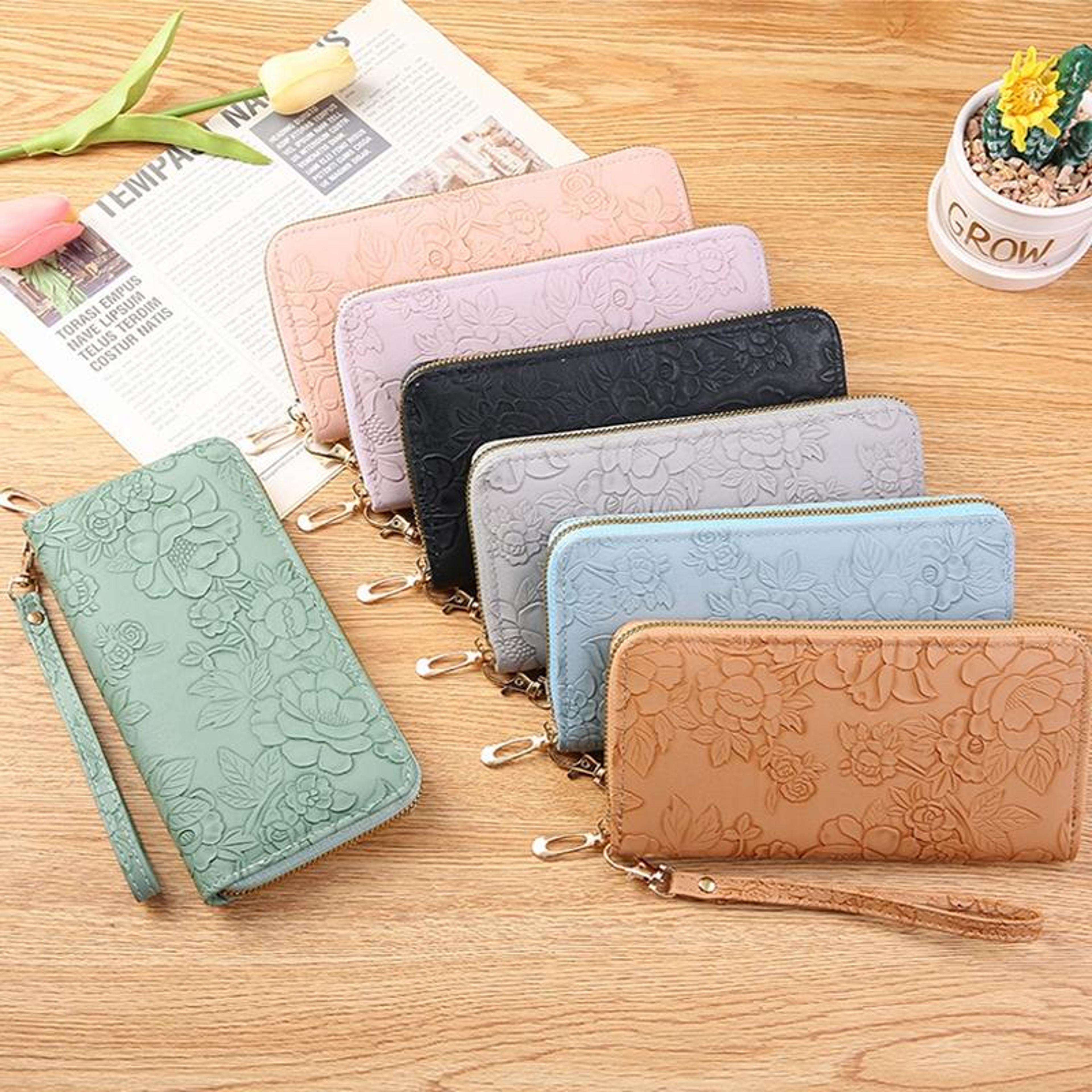 large capacity zip around wallet with embossed design and multi card holder
