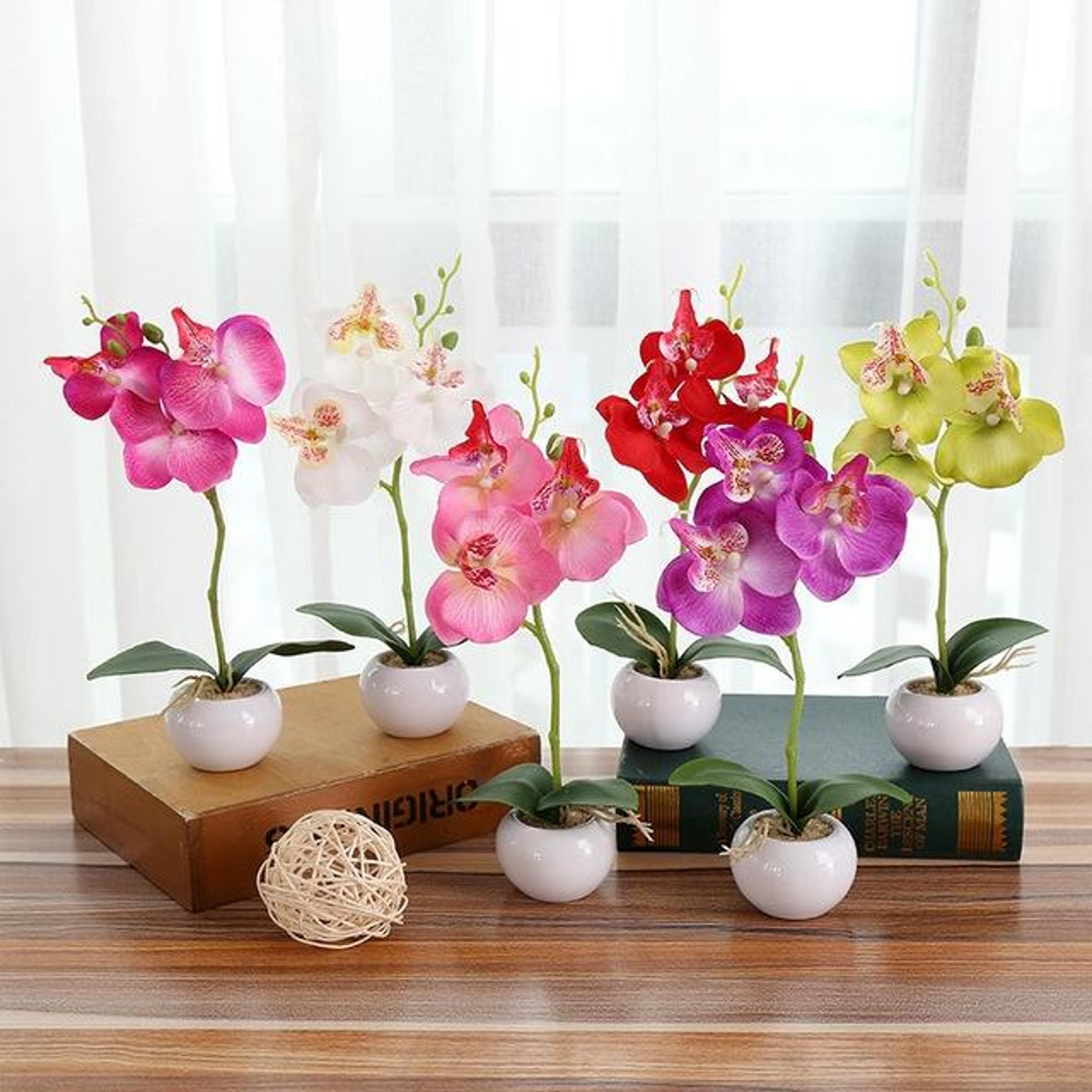 artificial orchid plant in ceramic flower pot decorative faux potted floral arrangement