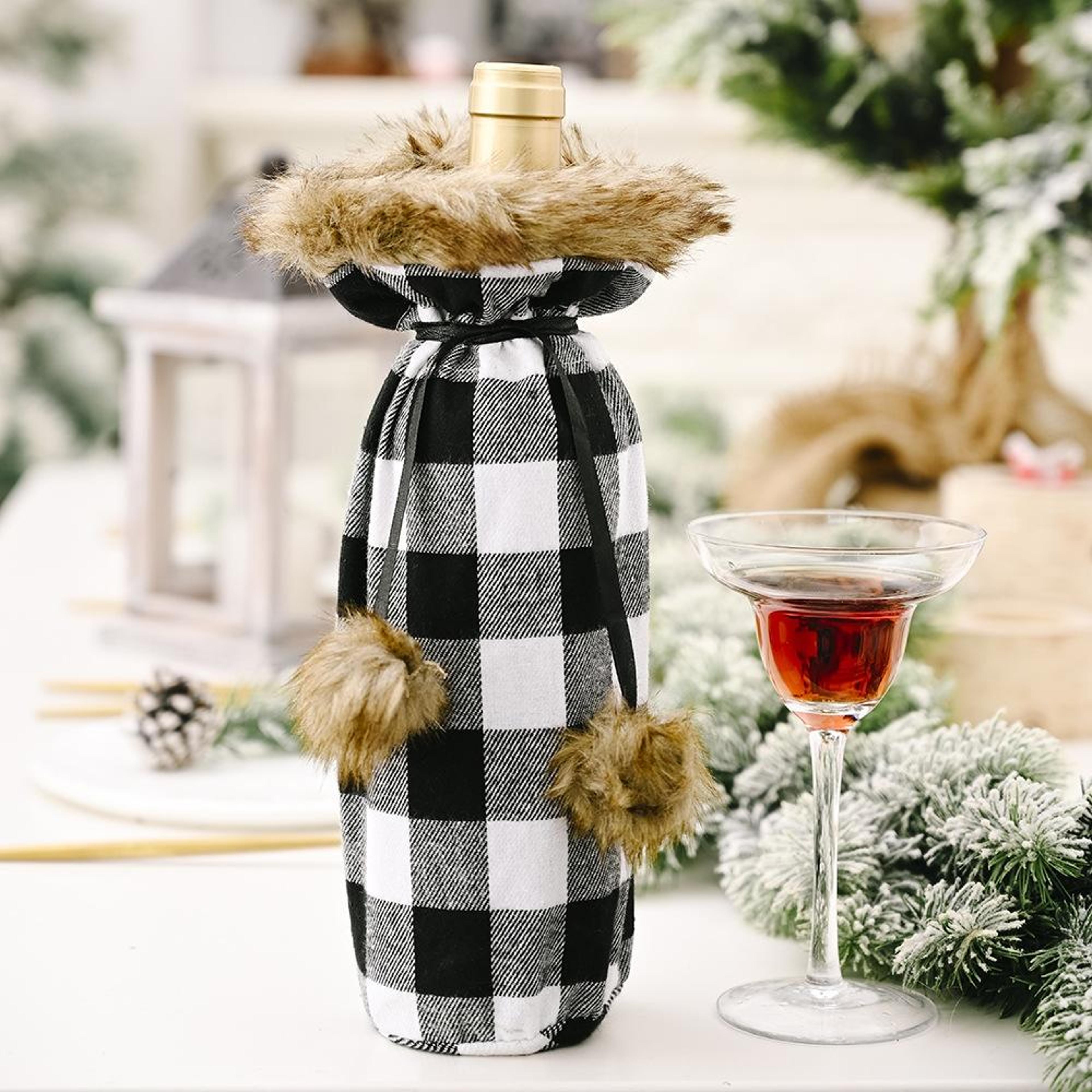 plaid christmas wine bottle cover with pom poms and faux fur trim holiday wine gift bag