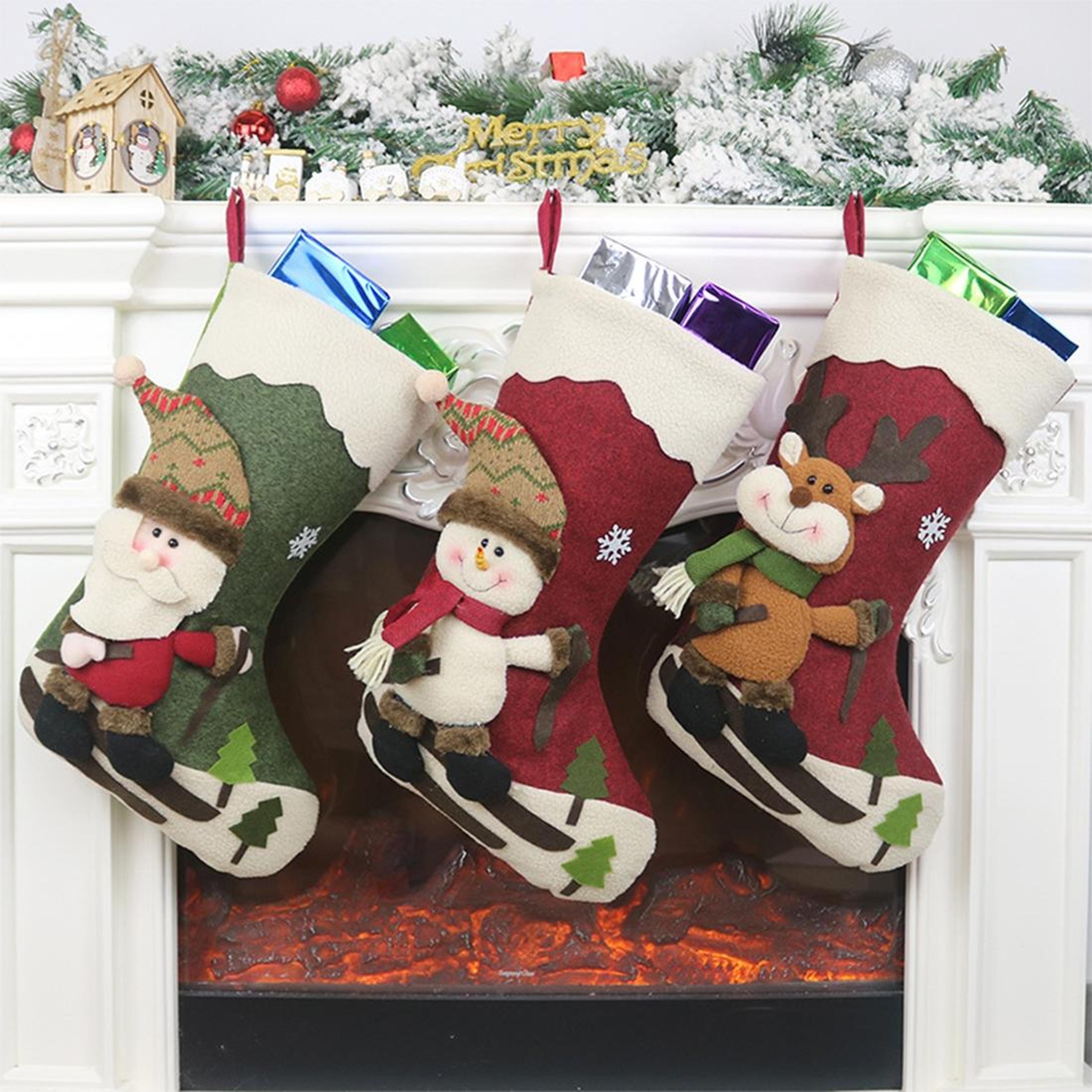 christmas stocking gift bag with santa claus design for holiday hanging decor