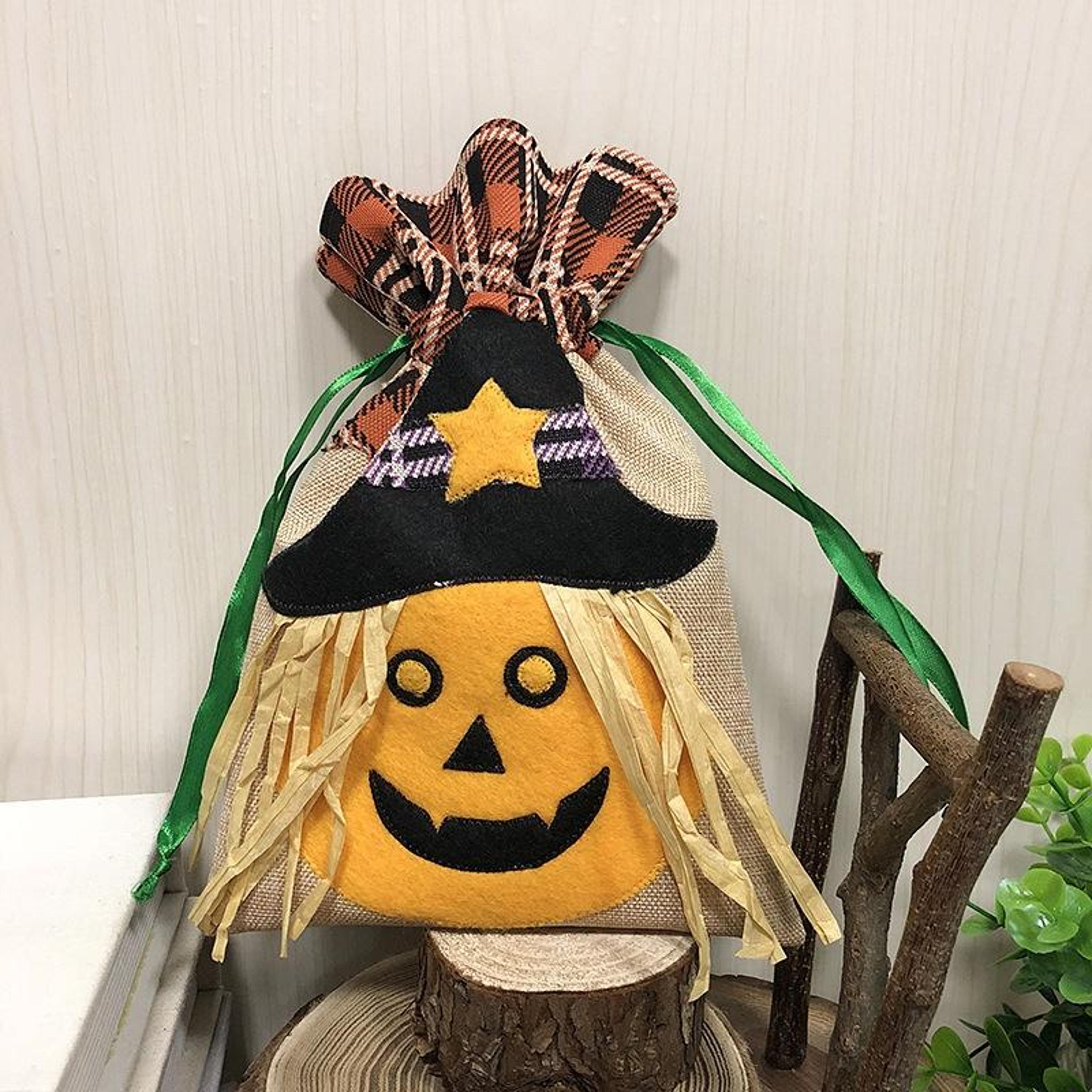 kids halloween trick or treat bag with pumpkin witch design and drawstring closure
