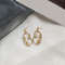 Zinc Alloy Wire Face Earrings