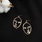 Zinc Alloy Wire Face Earrings 3